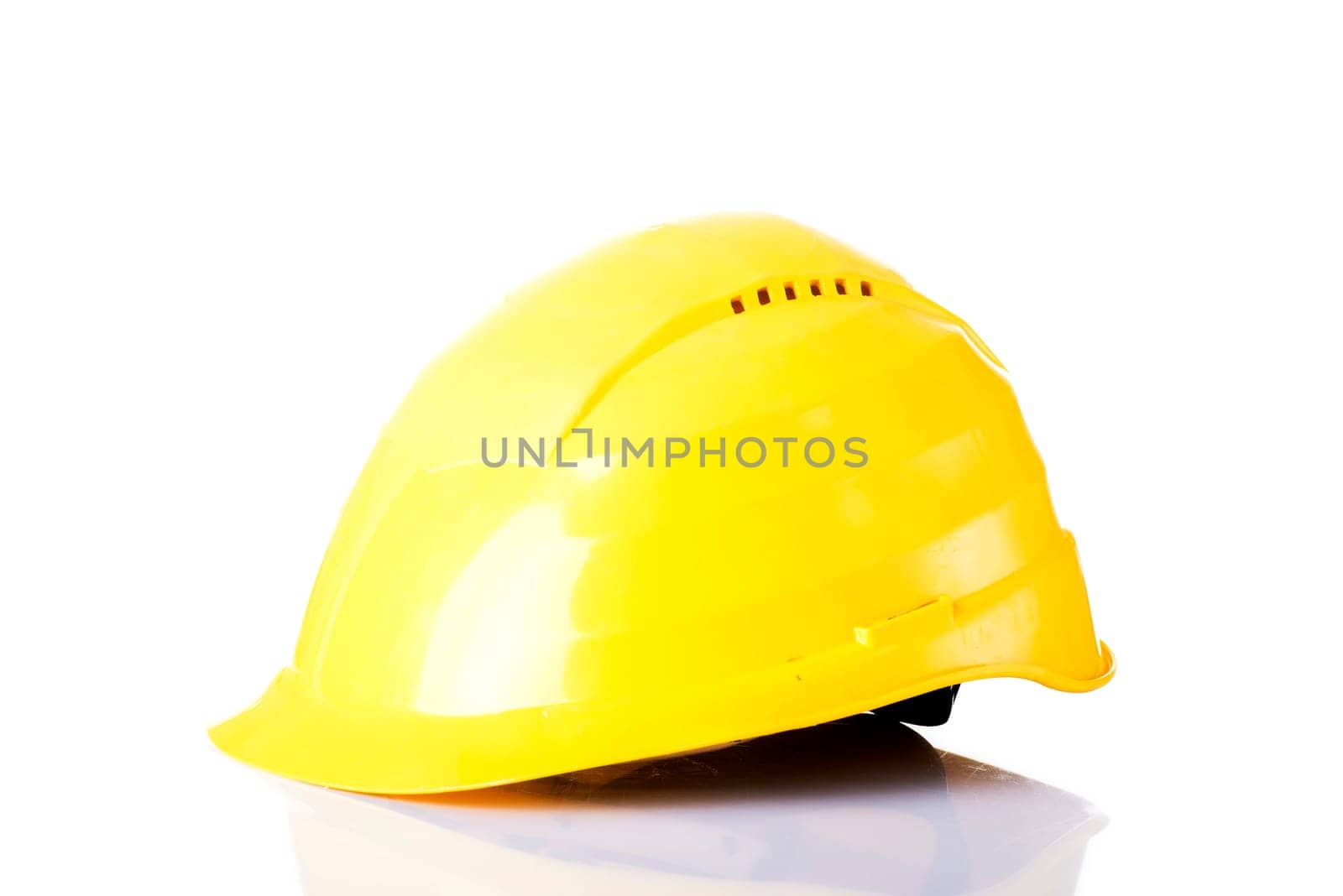 Yellow helmet isolated on white