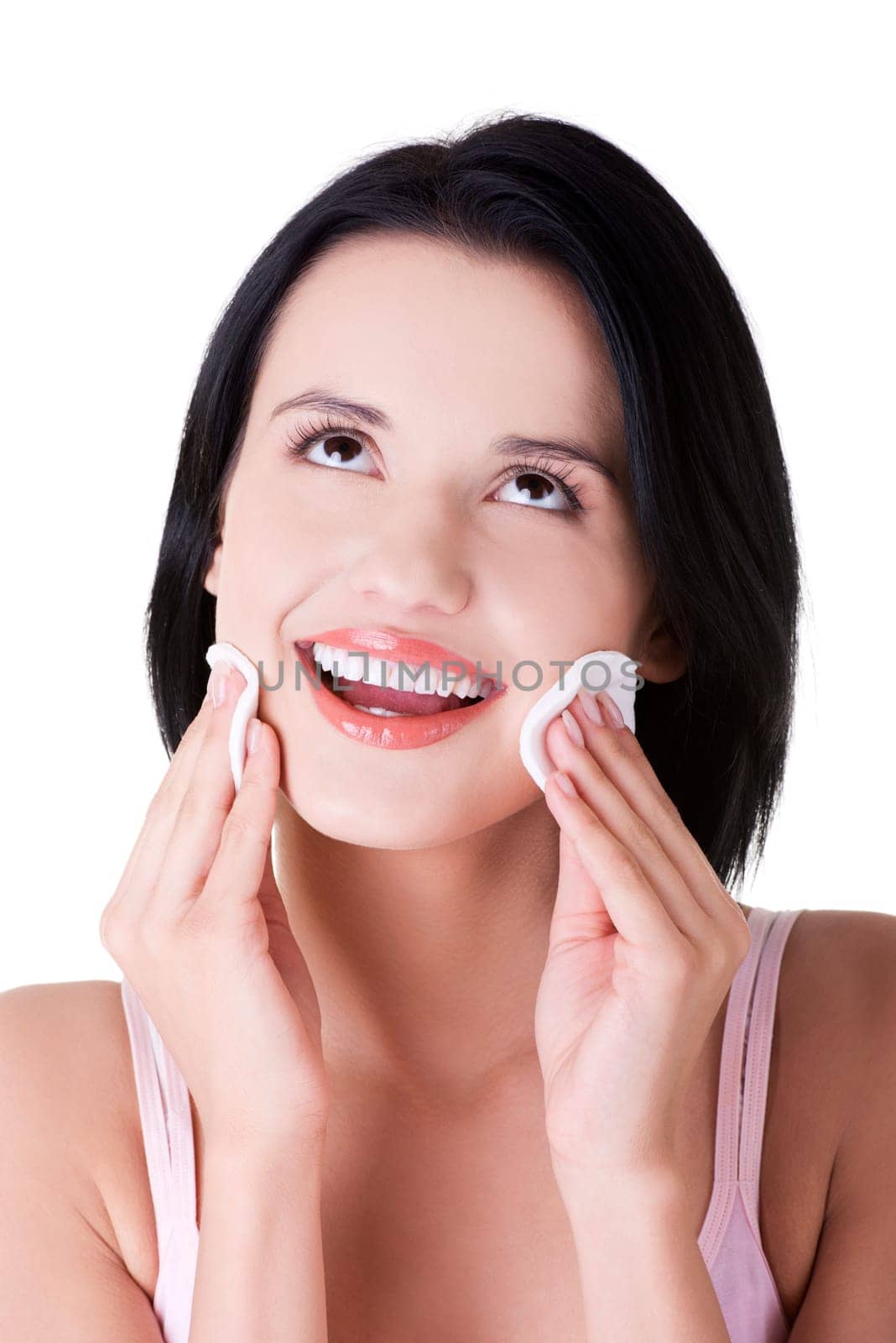 Closeup portrait of beautiful woman with cotton pad