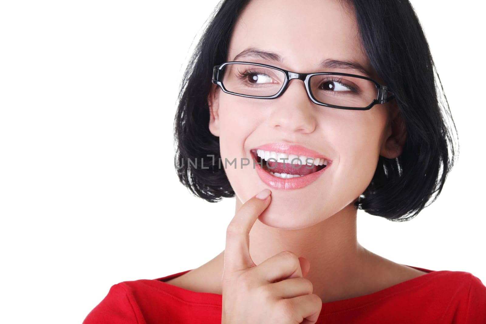 Portrait of a happy young woman looking left - isolated on white