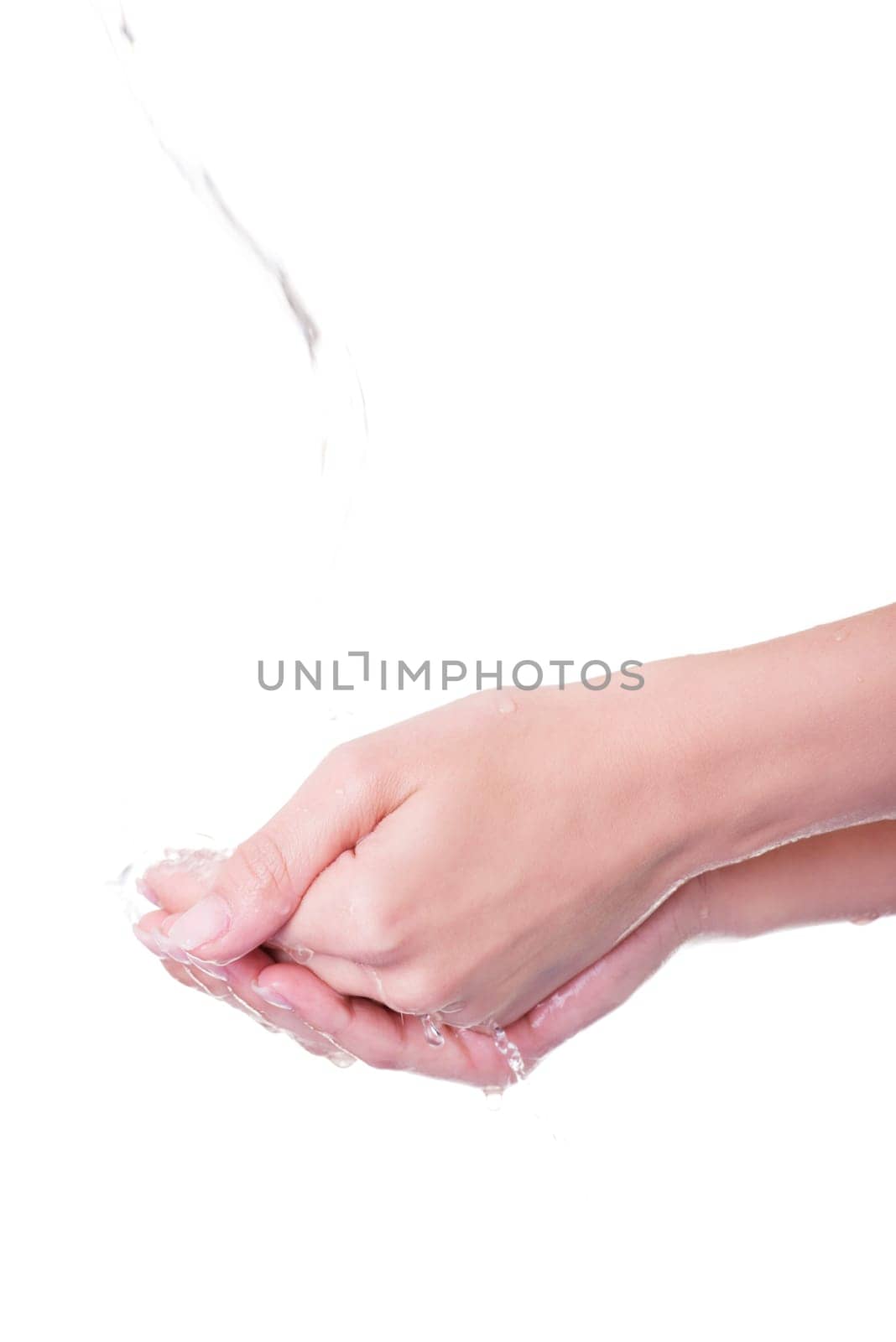 Pouring water splashing on hand, isolated on white