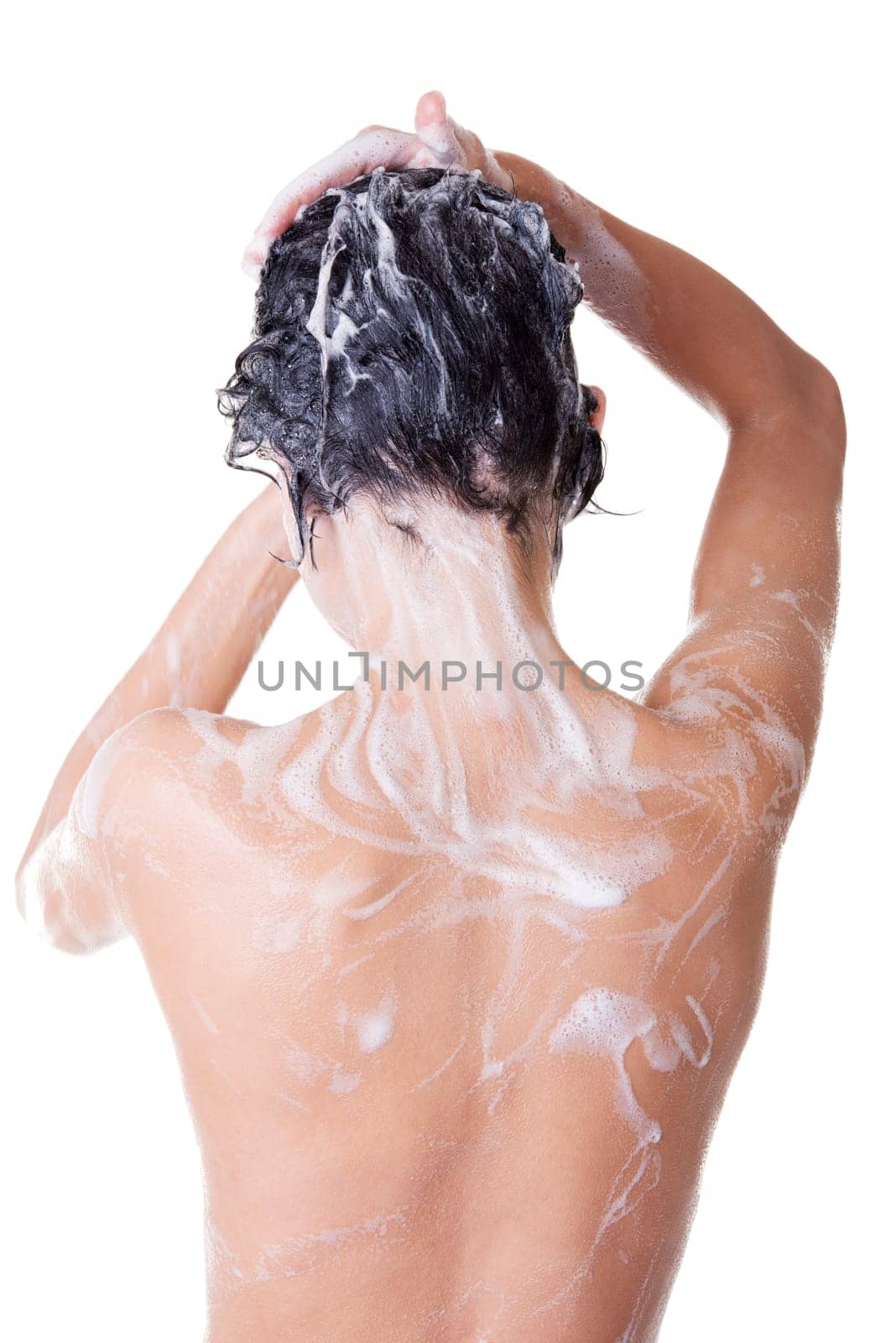 Young fit beautiful woman in shower washing her perfect fit body