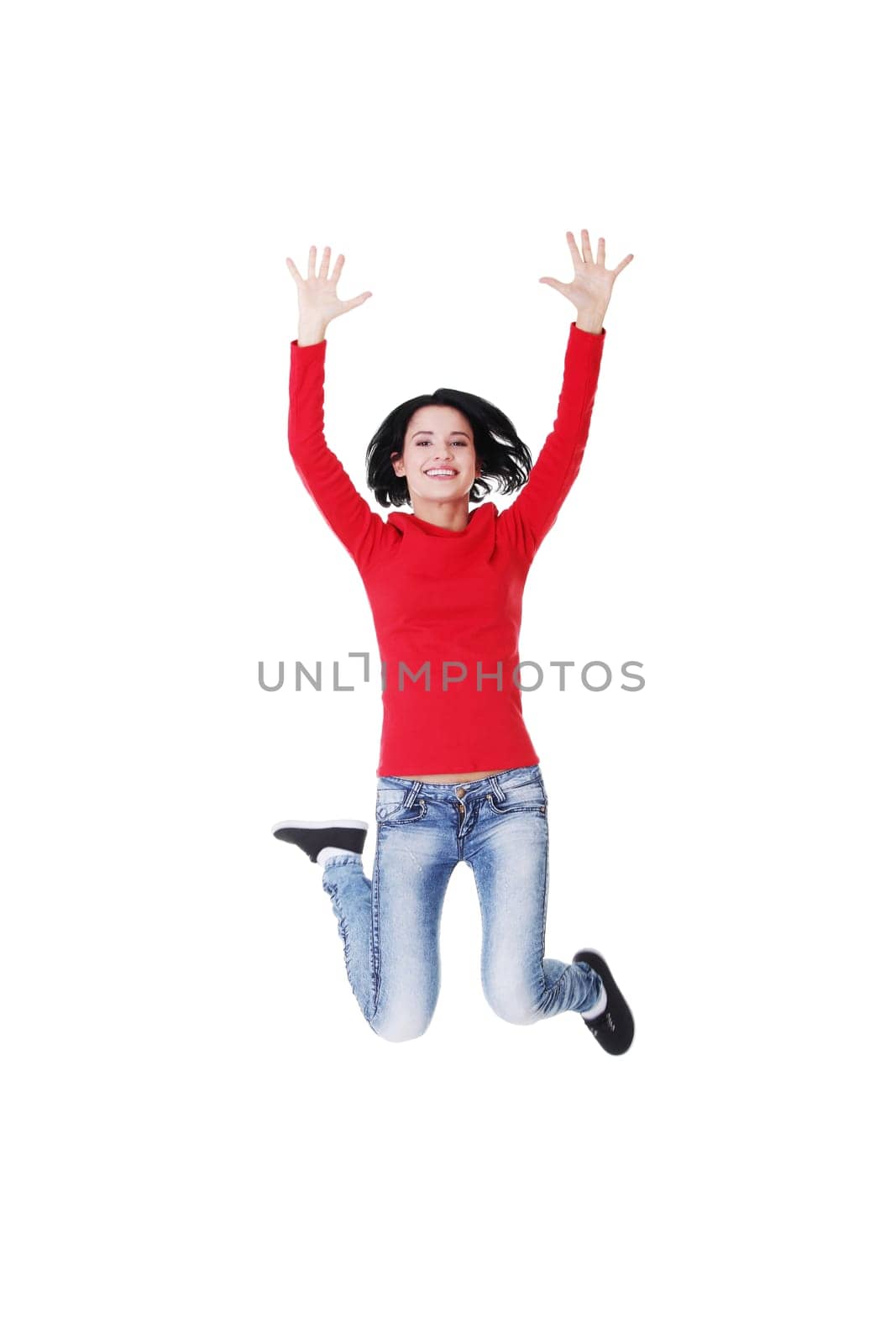 Jumping happy teen girl, isolated on white background