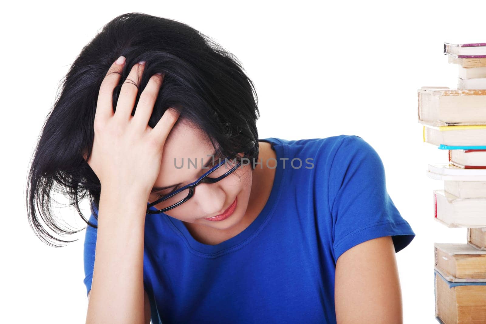 Sad female student with learning difficulties , isolated on white