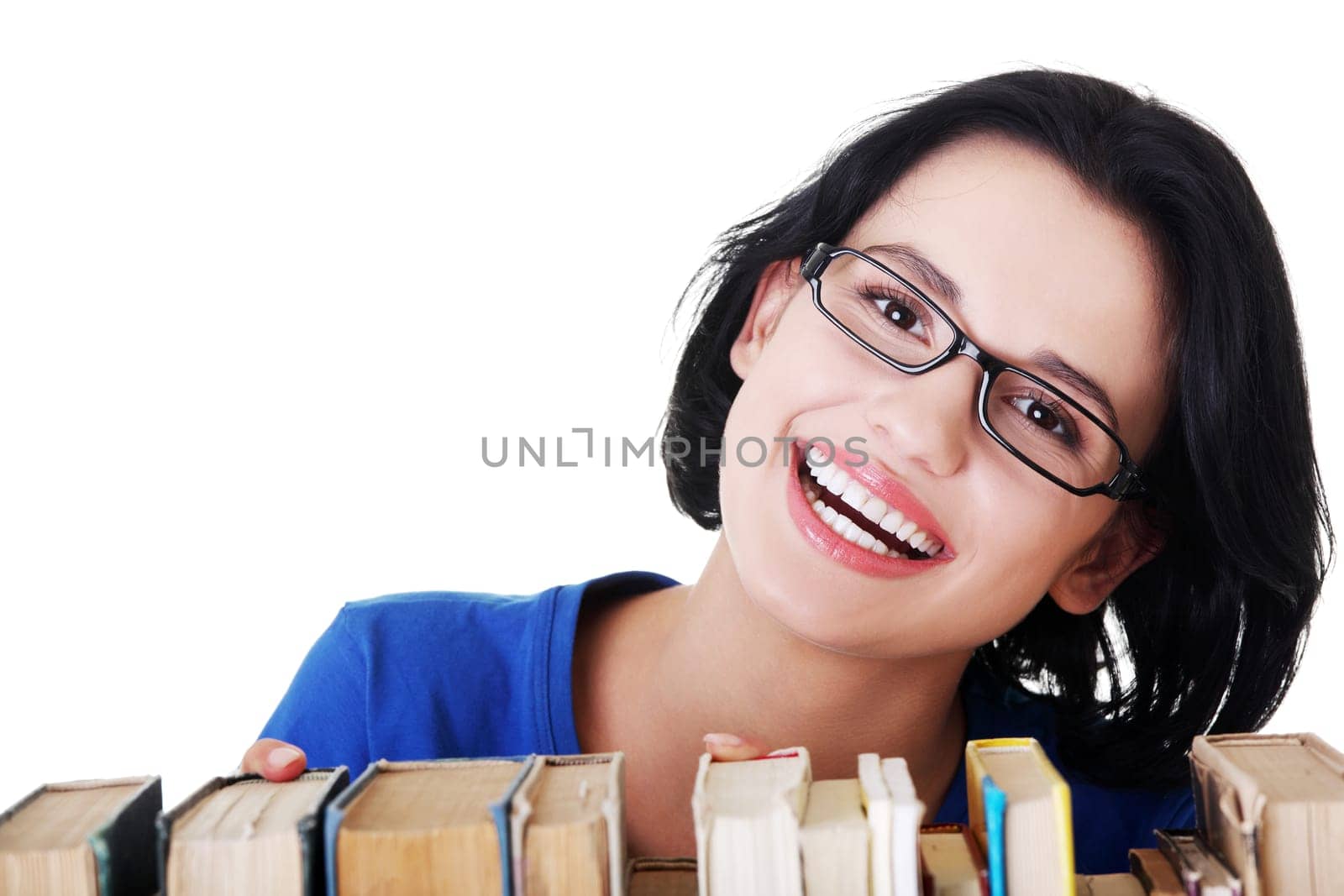 Happy smiling young student woman with books, isolated on white background