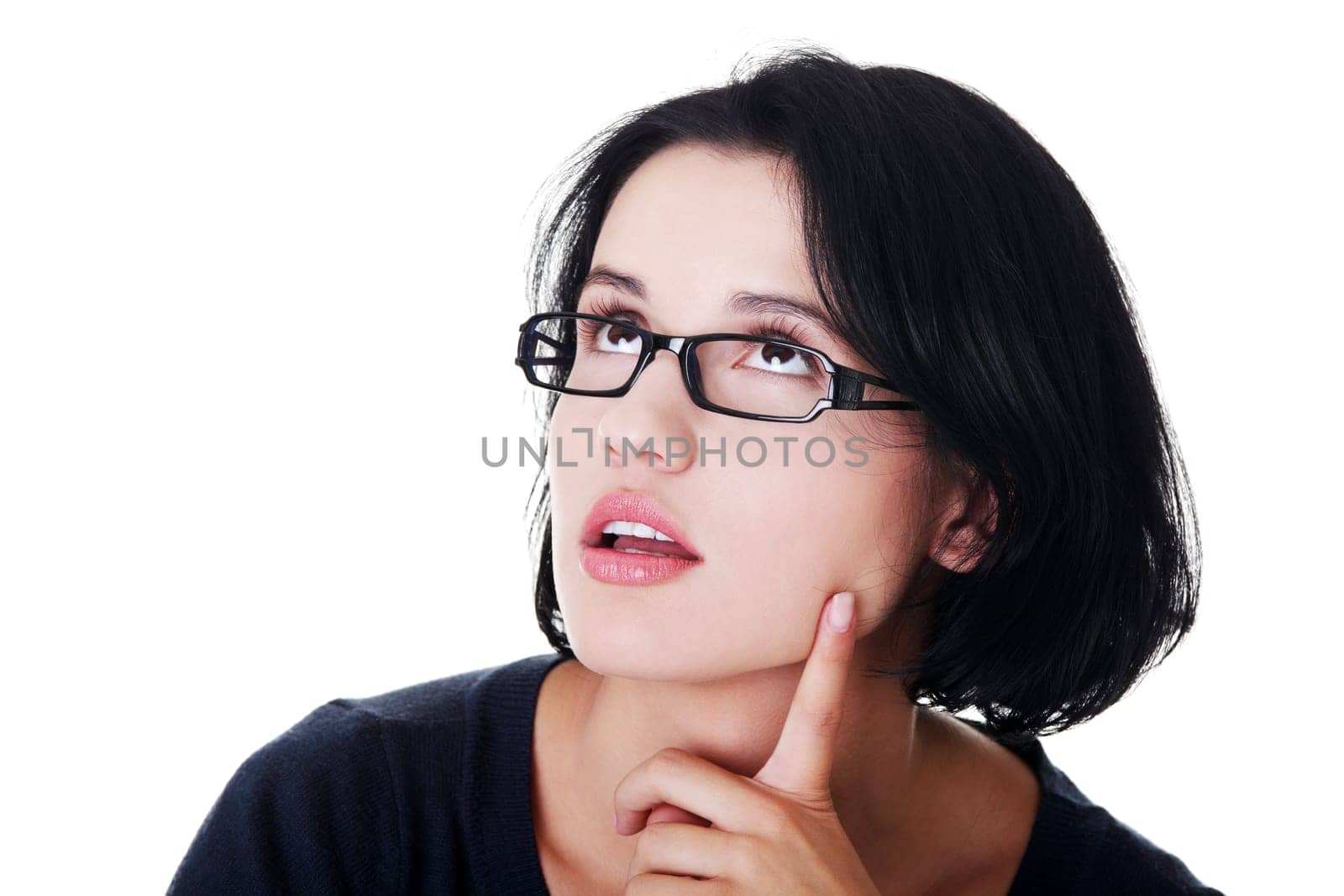 Young beautiful woman in casual clothes thinking, isolated on white