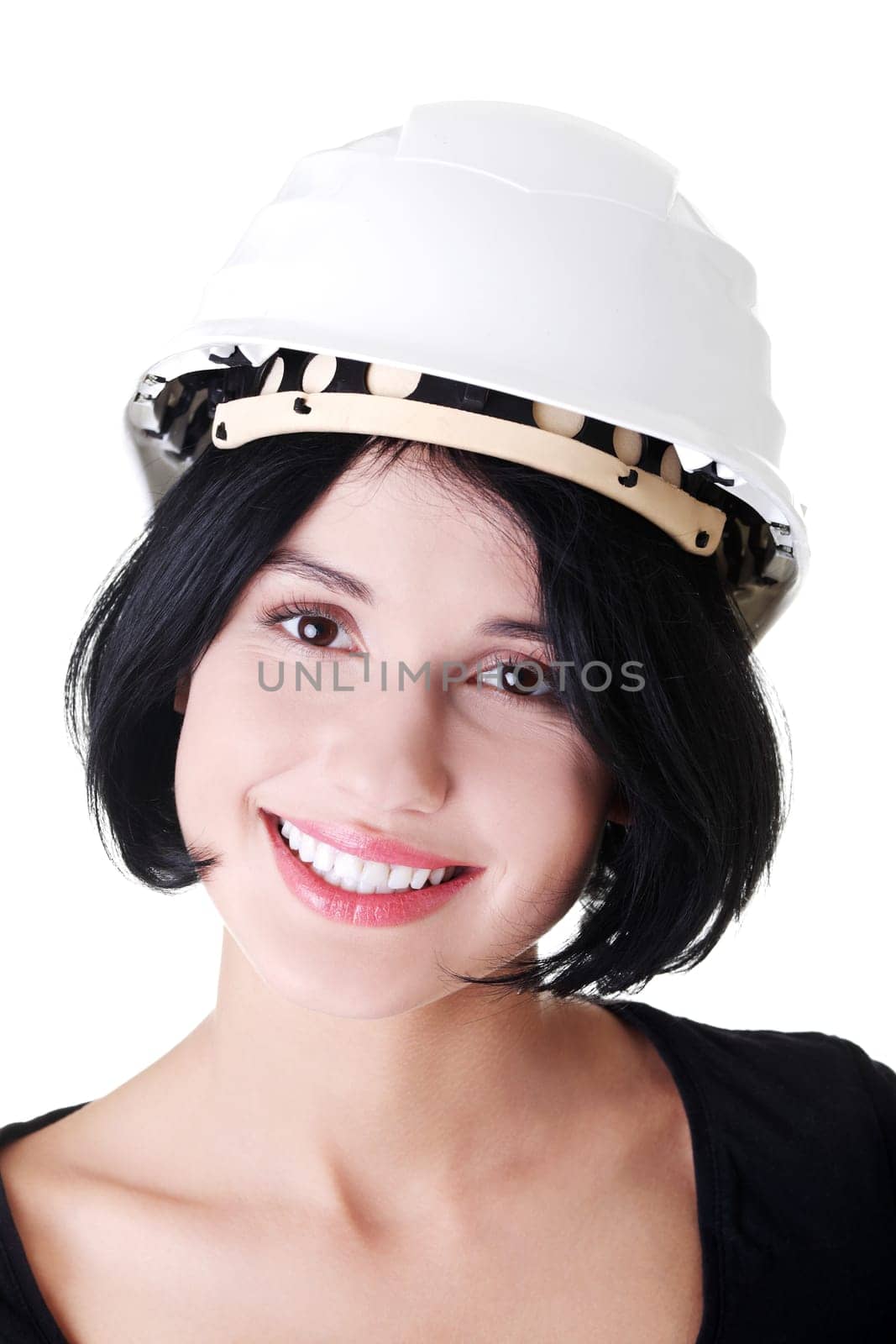 Portrait of confident female worker in helmet. Isolated on white