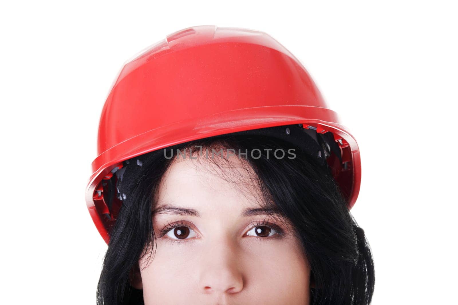 Portrait of confident female worker in helmet. Isolated on white