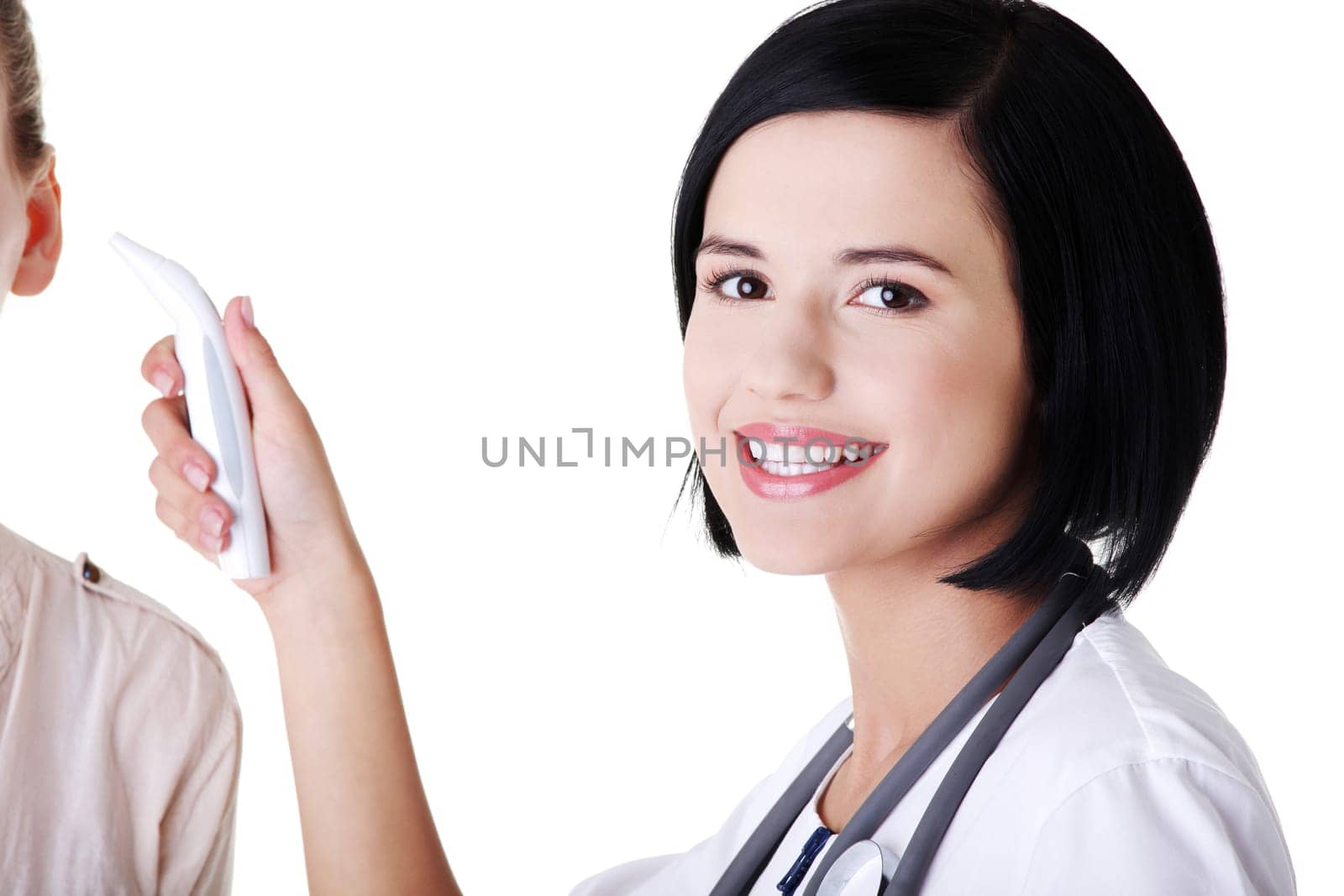 Female doctor or nurse checking temperature of her patient