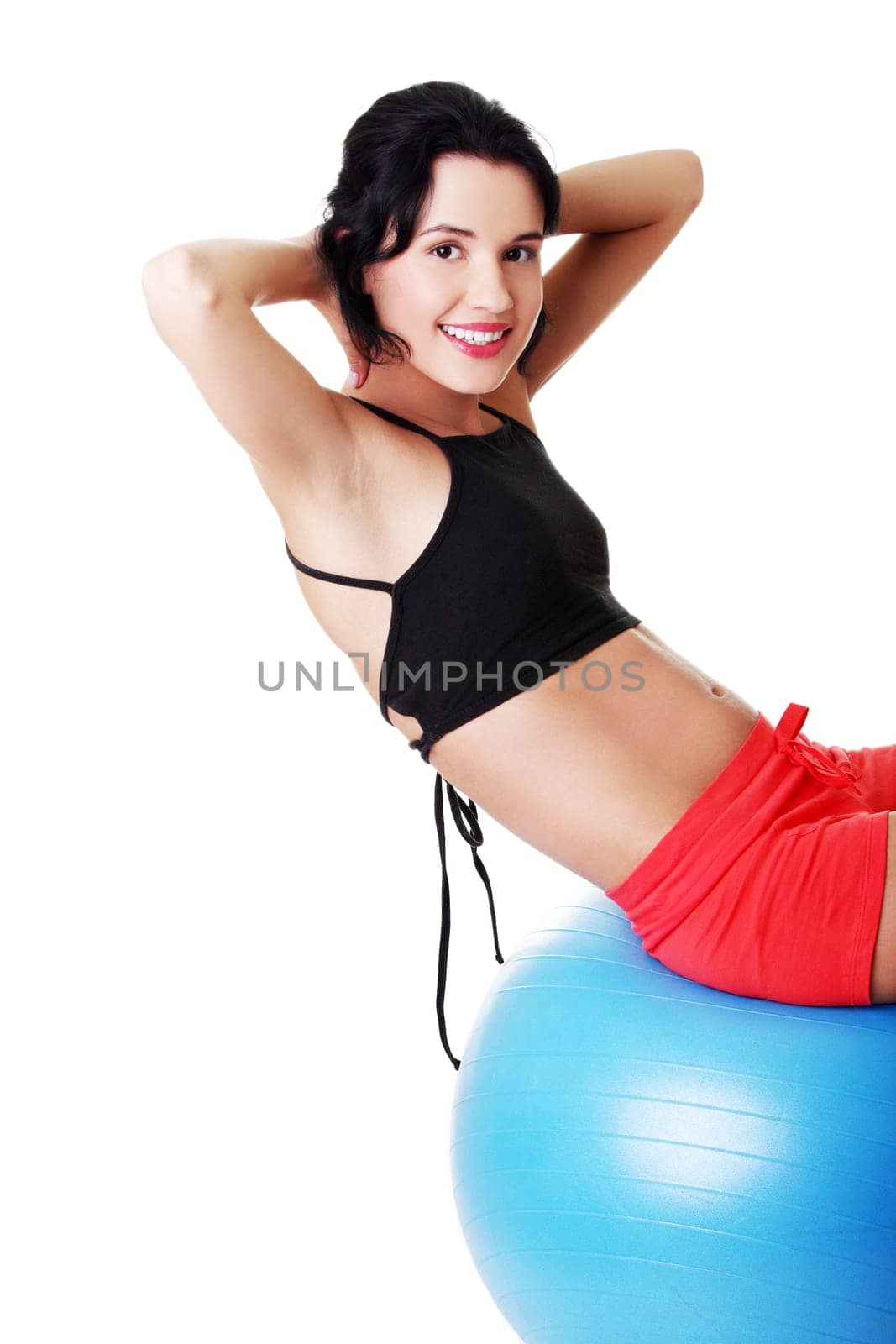Beautiful young healthy lifestyle woman with pilates exercise ball.