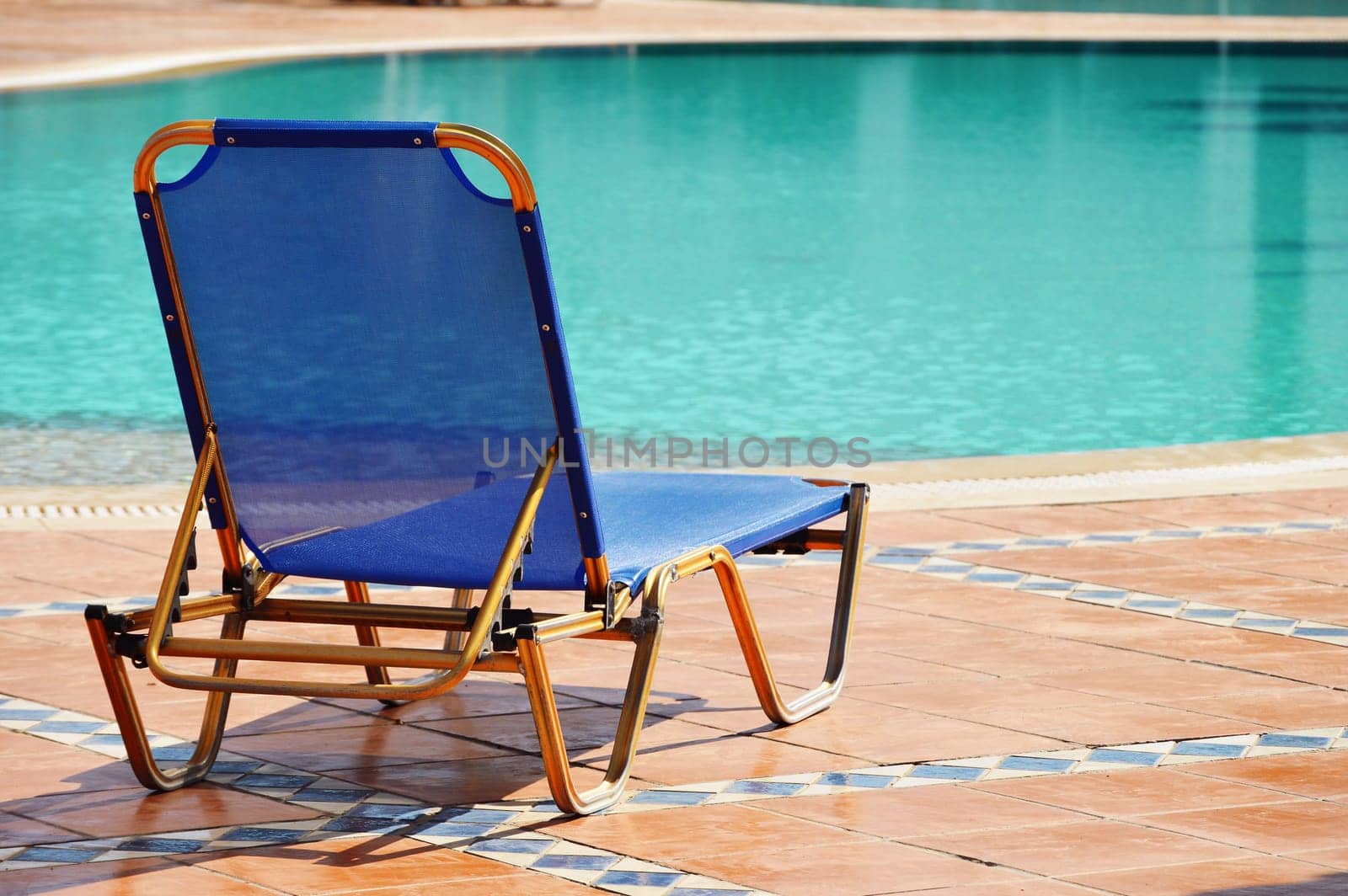 Swimming pool in touristic resort during summer time