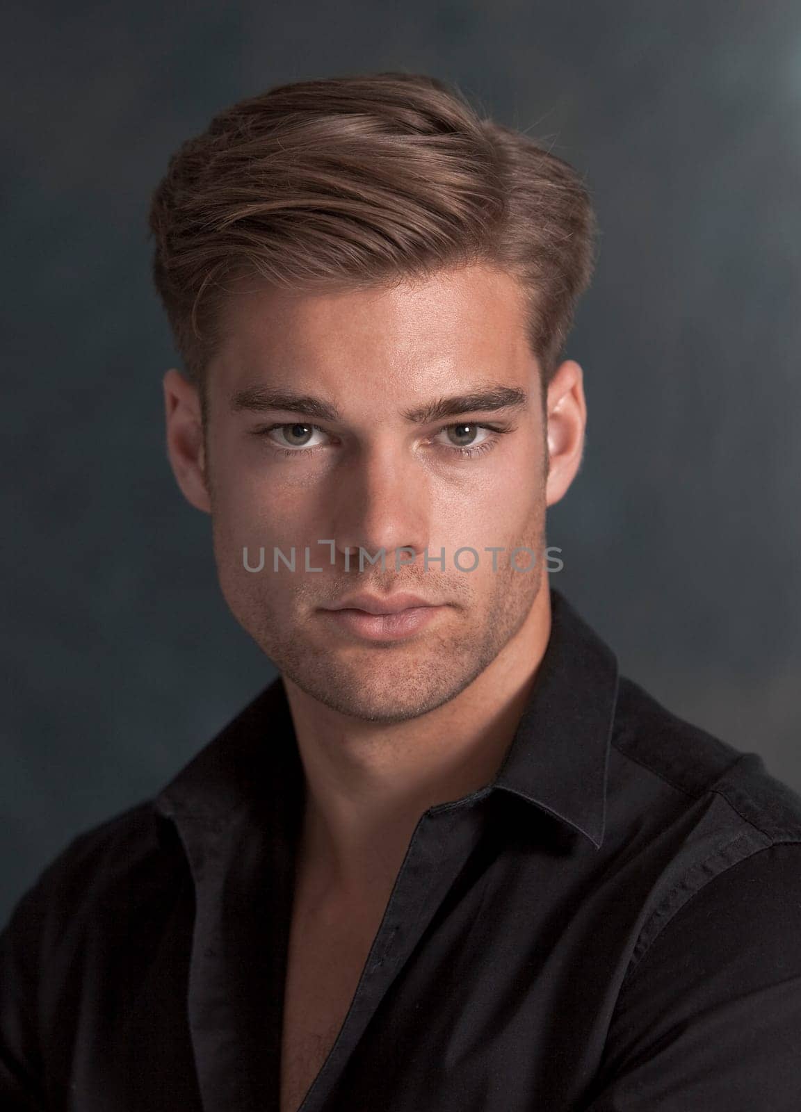 Studio portrait of handsome young man