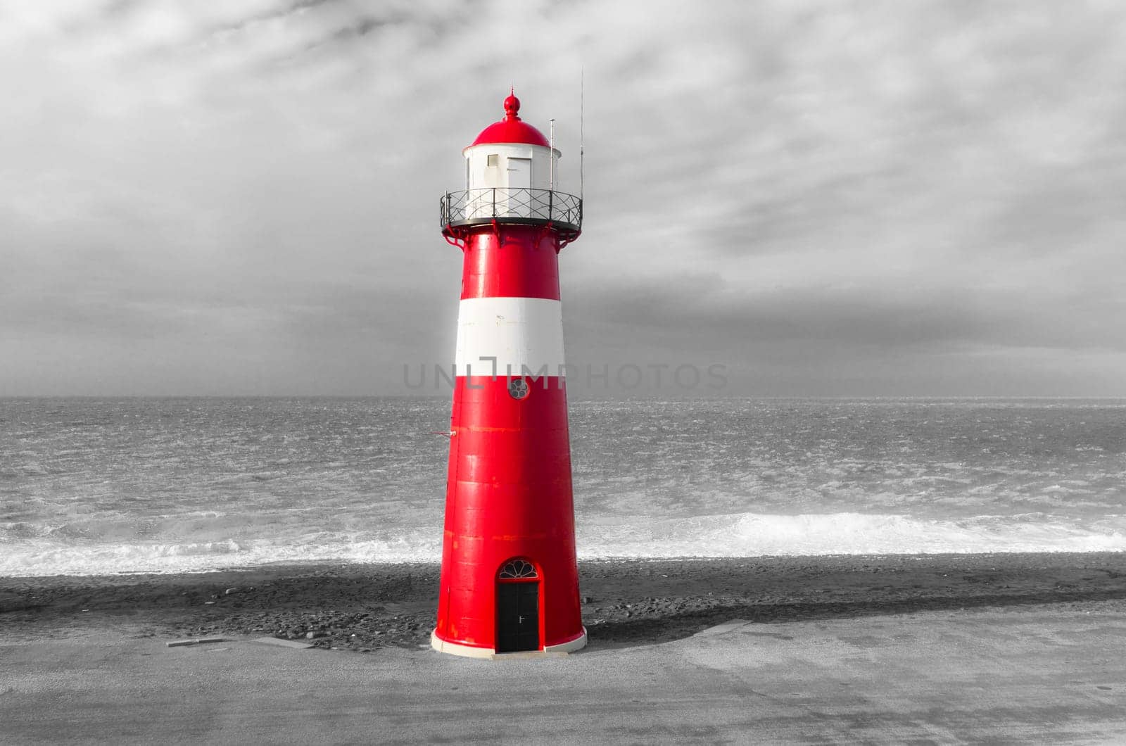 "Noorderhoofd""  lighthouse in Westkapelle, Netherlands. It has 3 colors of light, white (6000 candela), red and green (1800 candela). Together with the main lighthouse in the village it sends a light beacon to the ""Oostgat""."