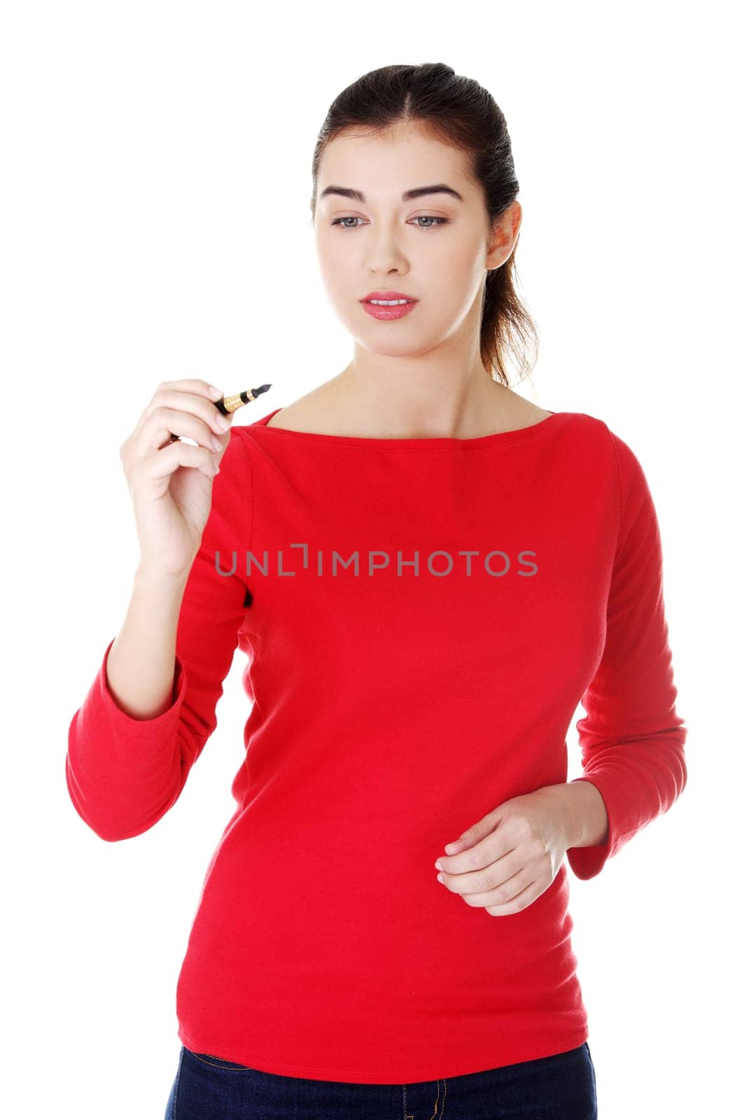 Young student woman writing something on abstract screen