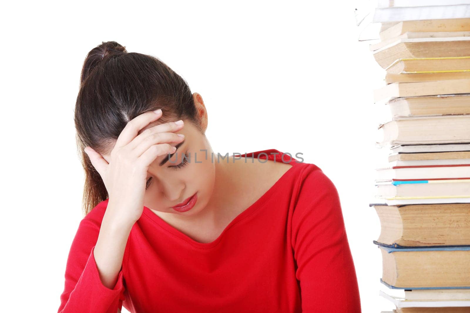 Sad female student with learning difficulties , isolated on white