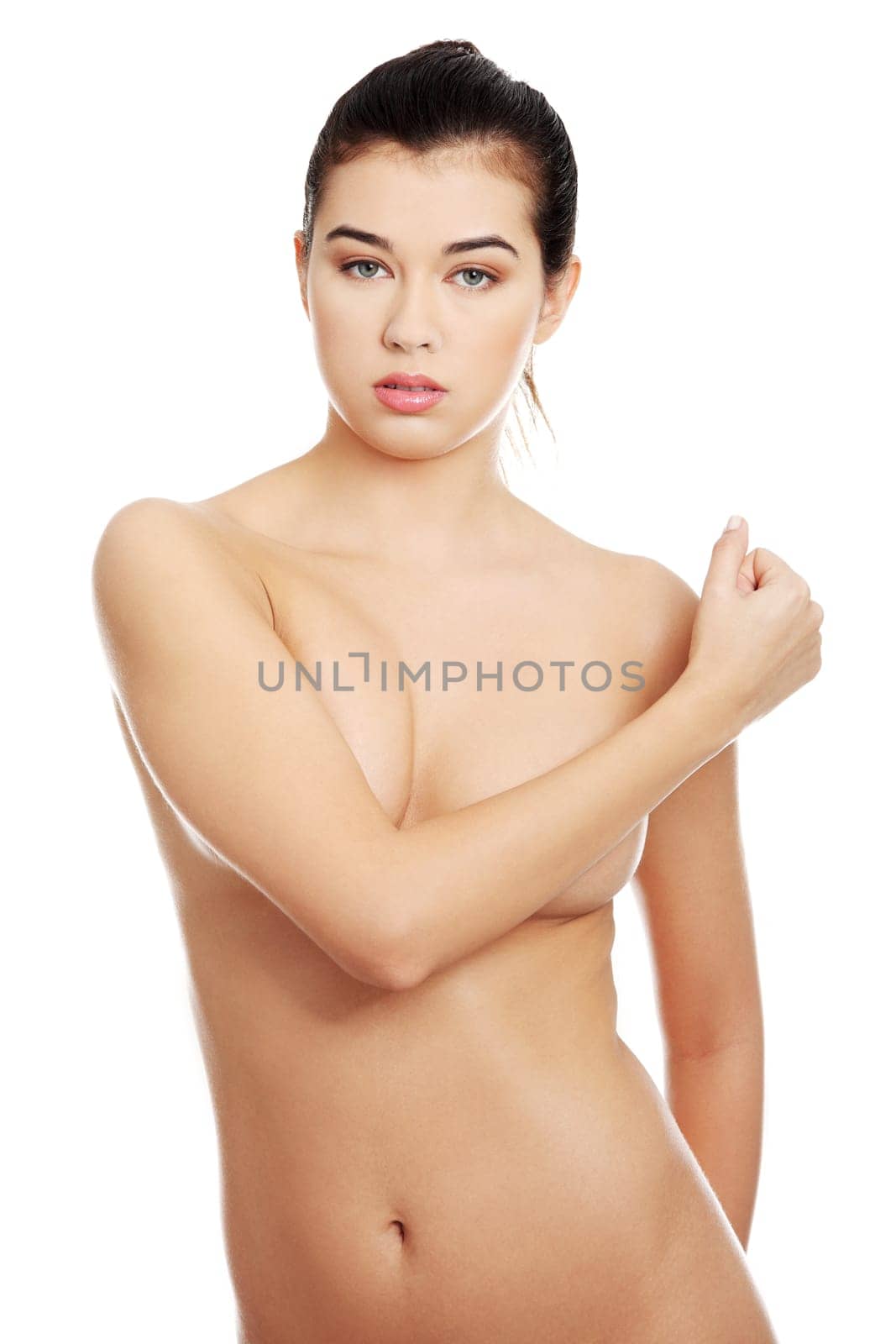 Beautiful attractive fit topless woman, isolated on white