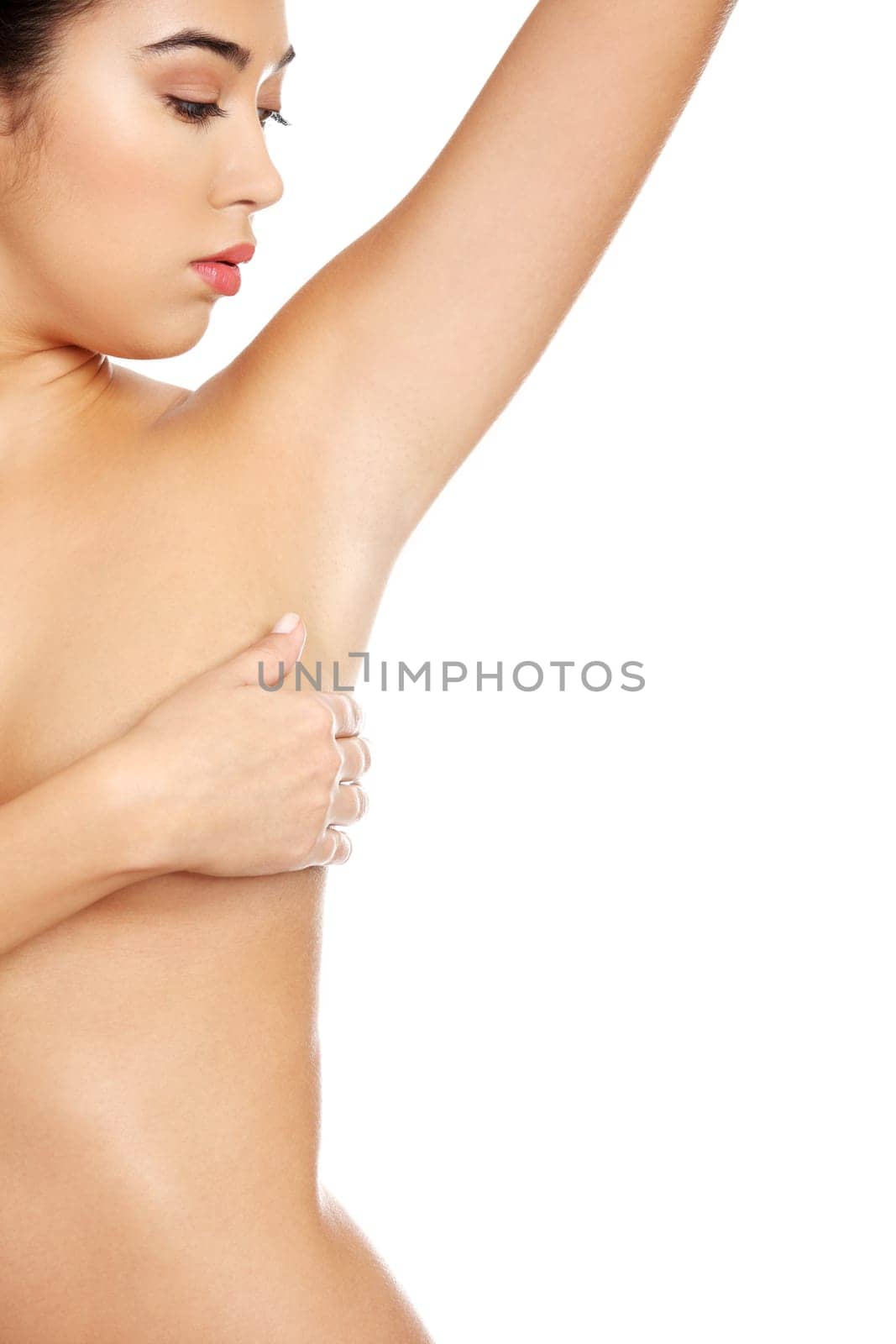 Breast cancer - Woman holding her breast