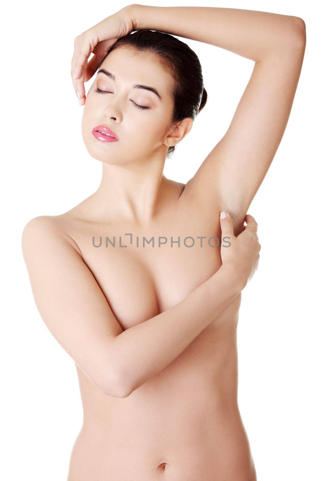 Beautiful fit topless woman, isolated on white