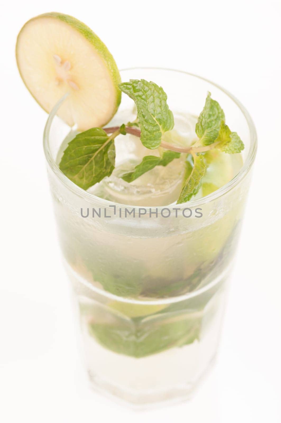 Mojito a Cuban cocktail made with cuban rum, lime, sugar , a splash of soda and flavoured with fresh fruit of your choice