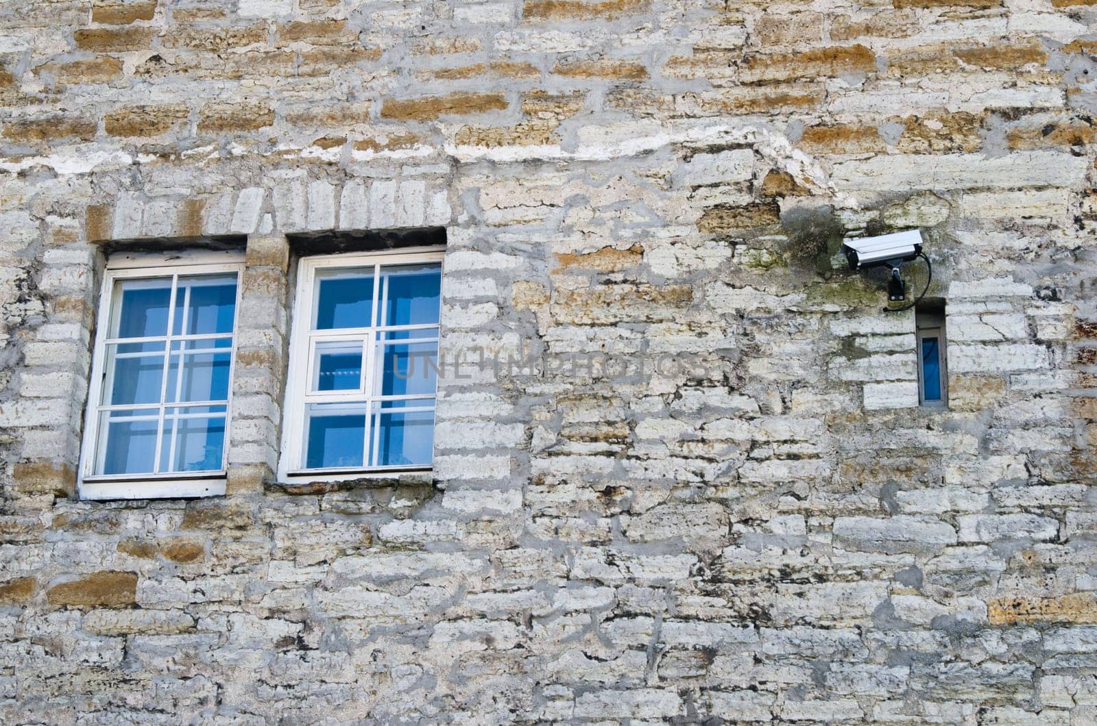 The chamber of video observation on a wall of a building near a window
