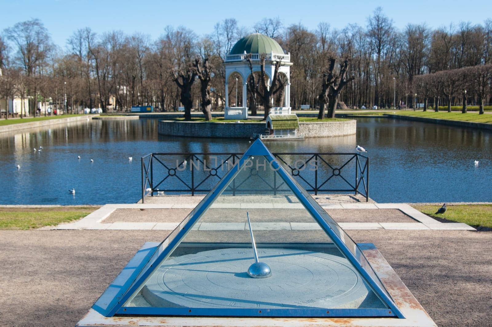 Ancient sundial at a pond in park Kadriorg, Tallinn