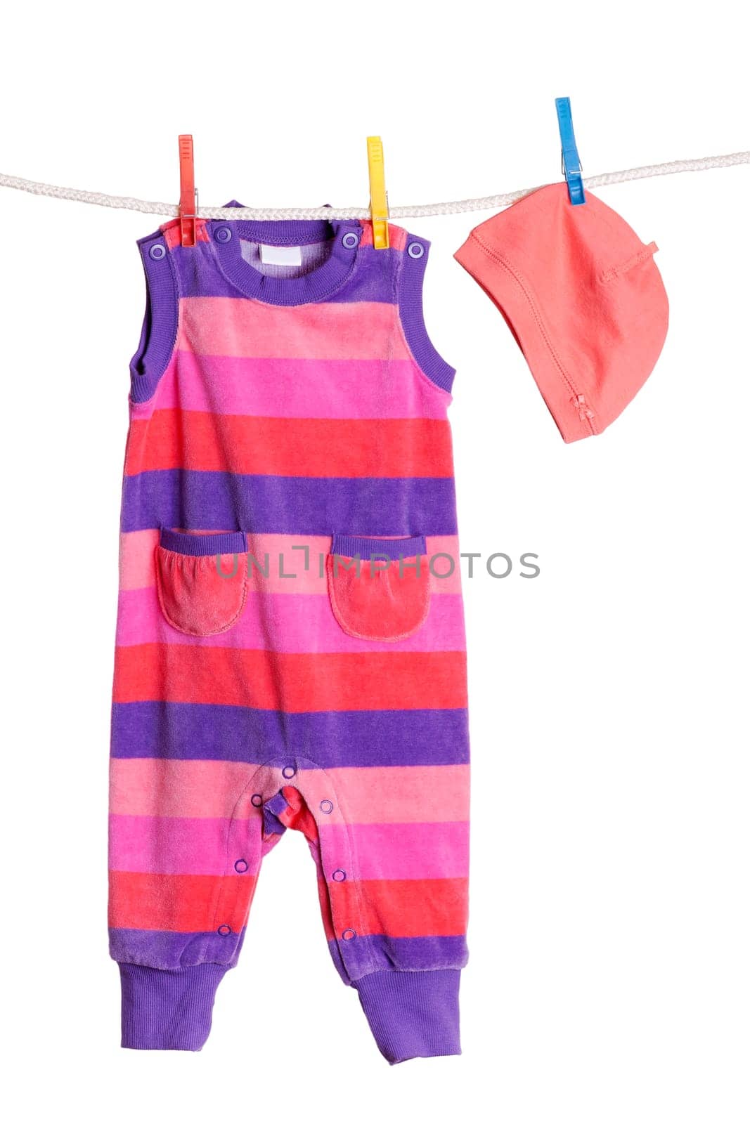 Baby Clothing Hanging on a Clothesline Isolated on White Background