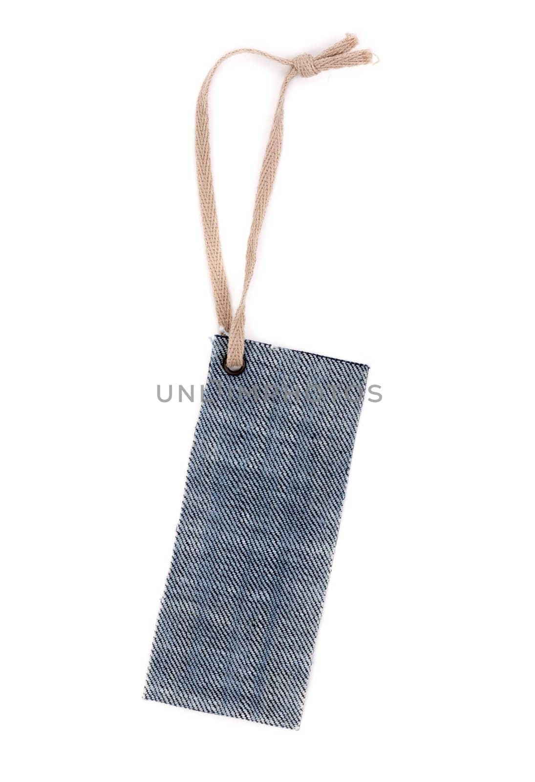 Blank denim label with rough rope. Isolate on white.