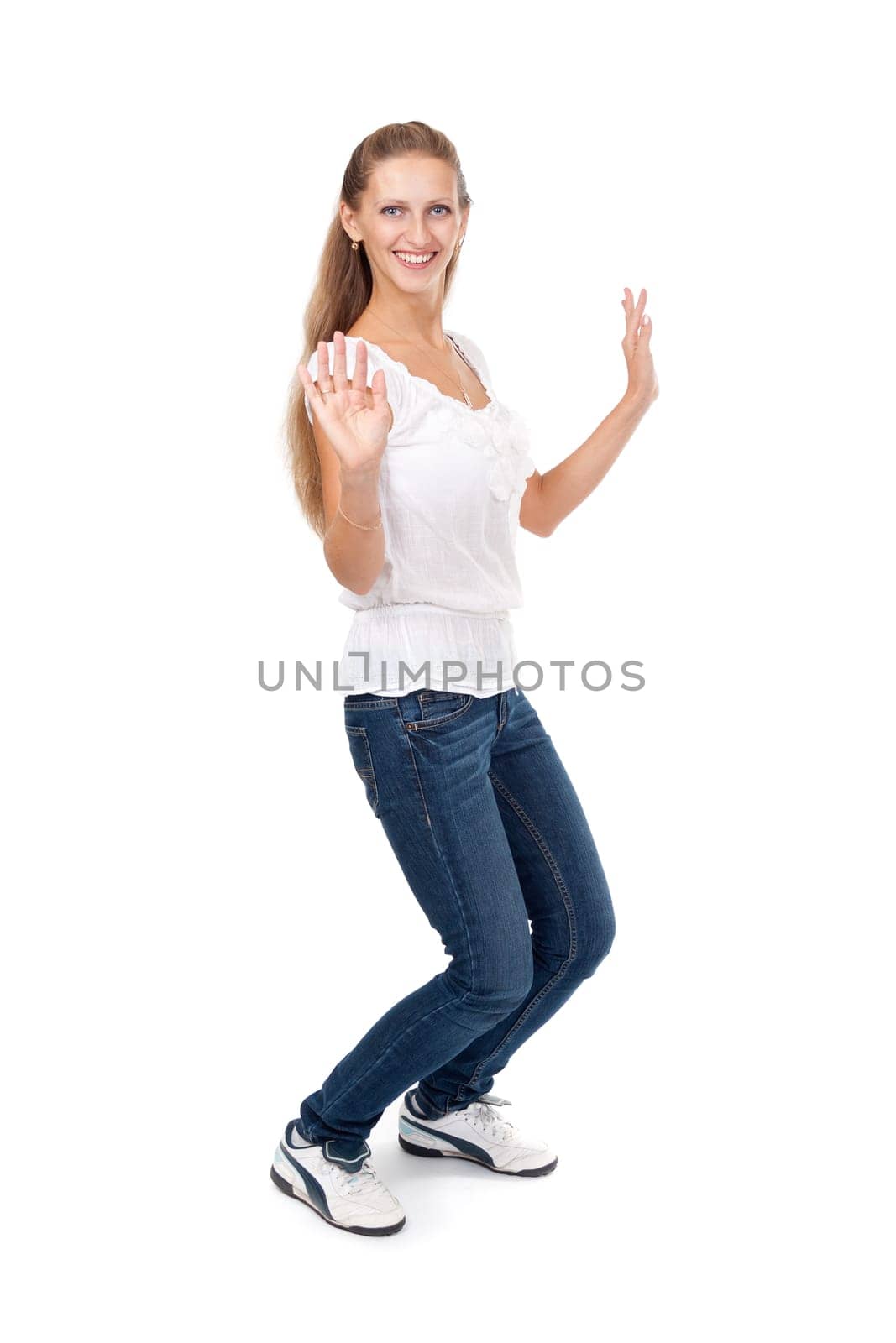 Happy beautiful girl dancing and celebrating standing in full-length. isolated on white background.