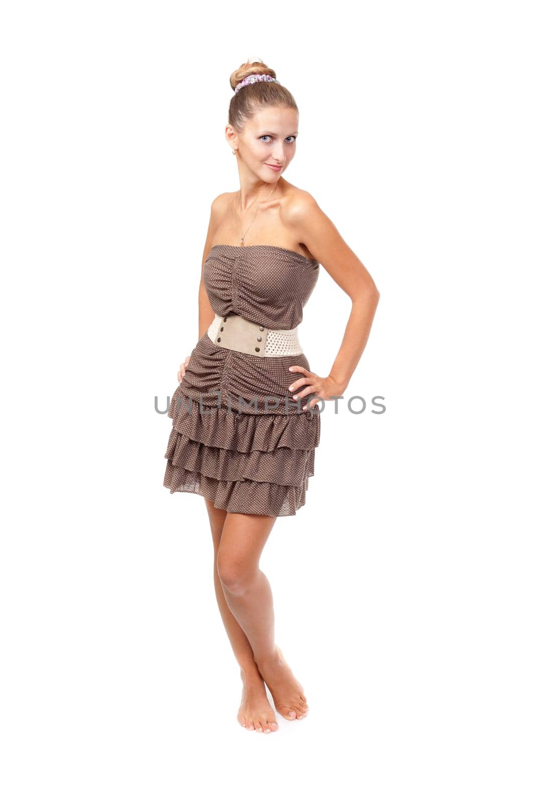 Full length of attractive young female in white dress posing isolate on white background