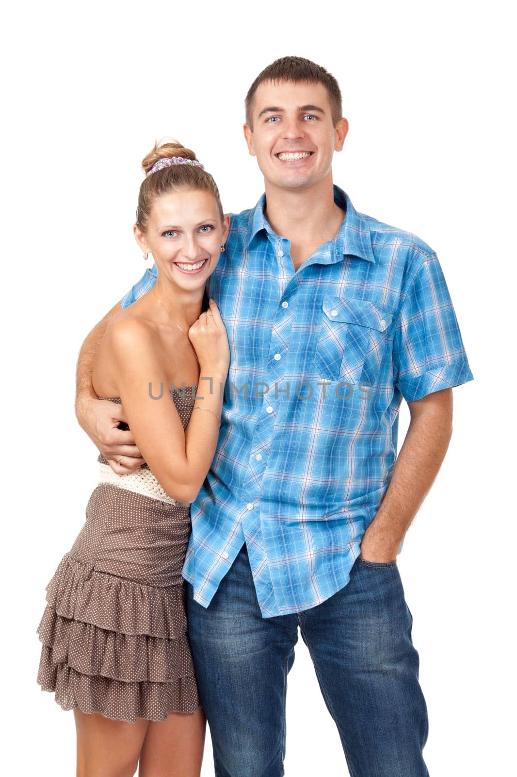 Portrait of a beautiful young happy smiling couple - isolated