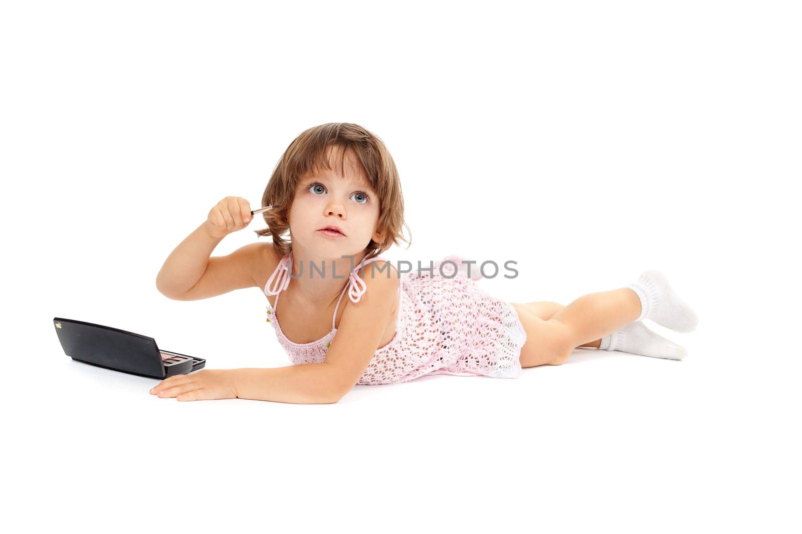 small girl with paint and mirror isolated on white