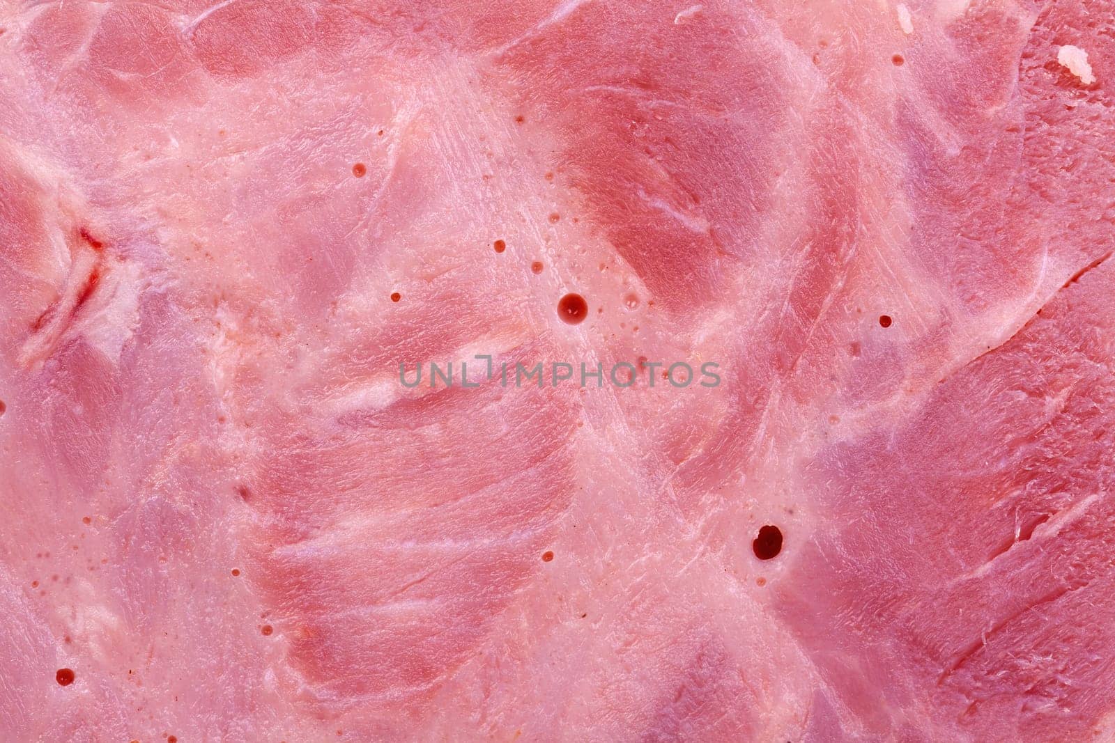 Background of delicious fresh ham with a splash of oil