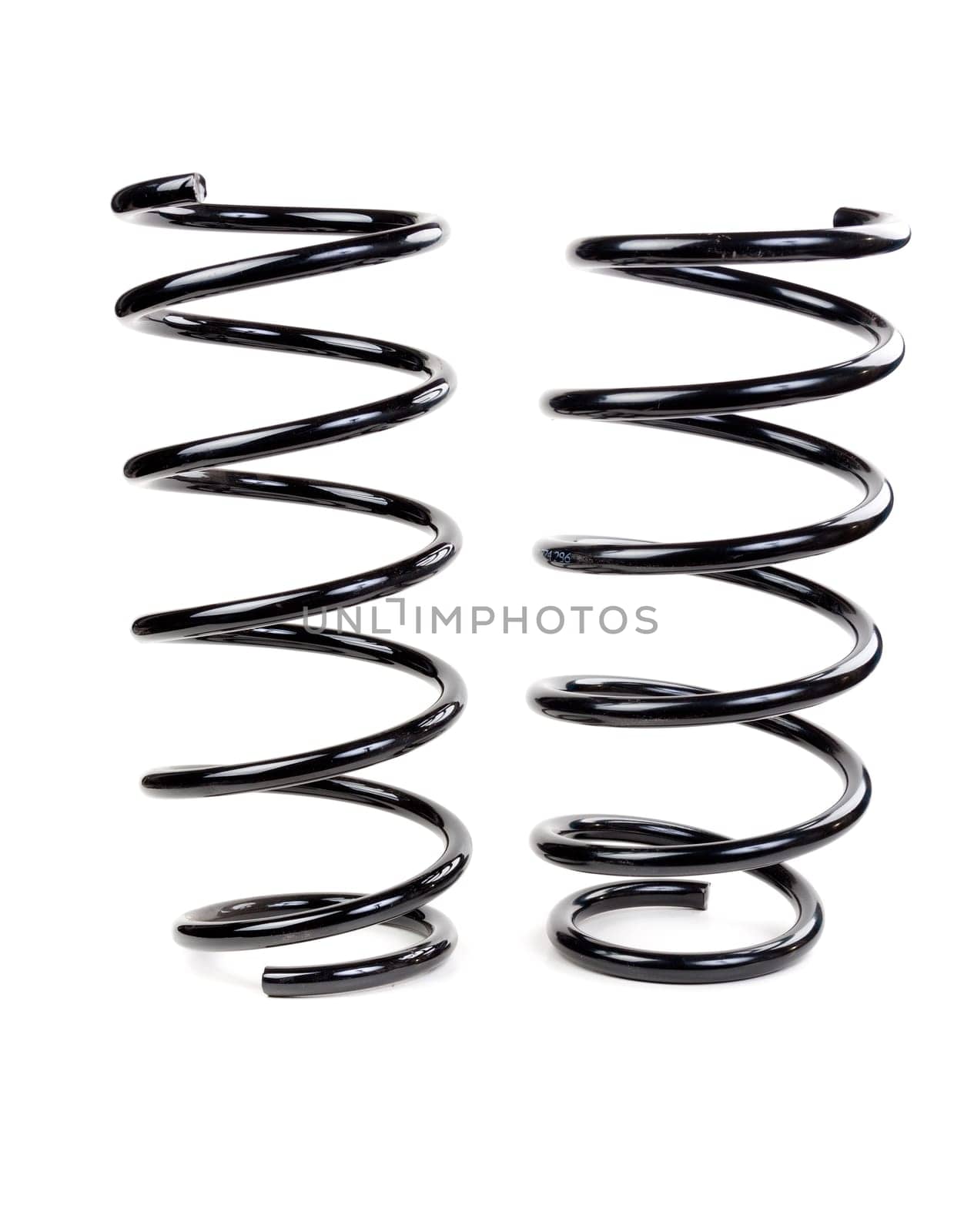 Pair of car spring isolated on white background