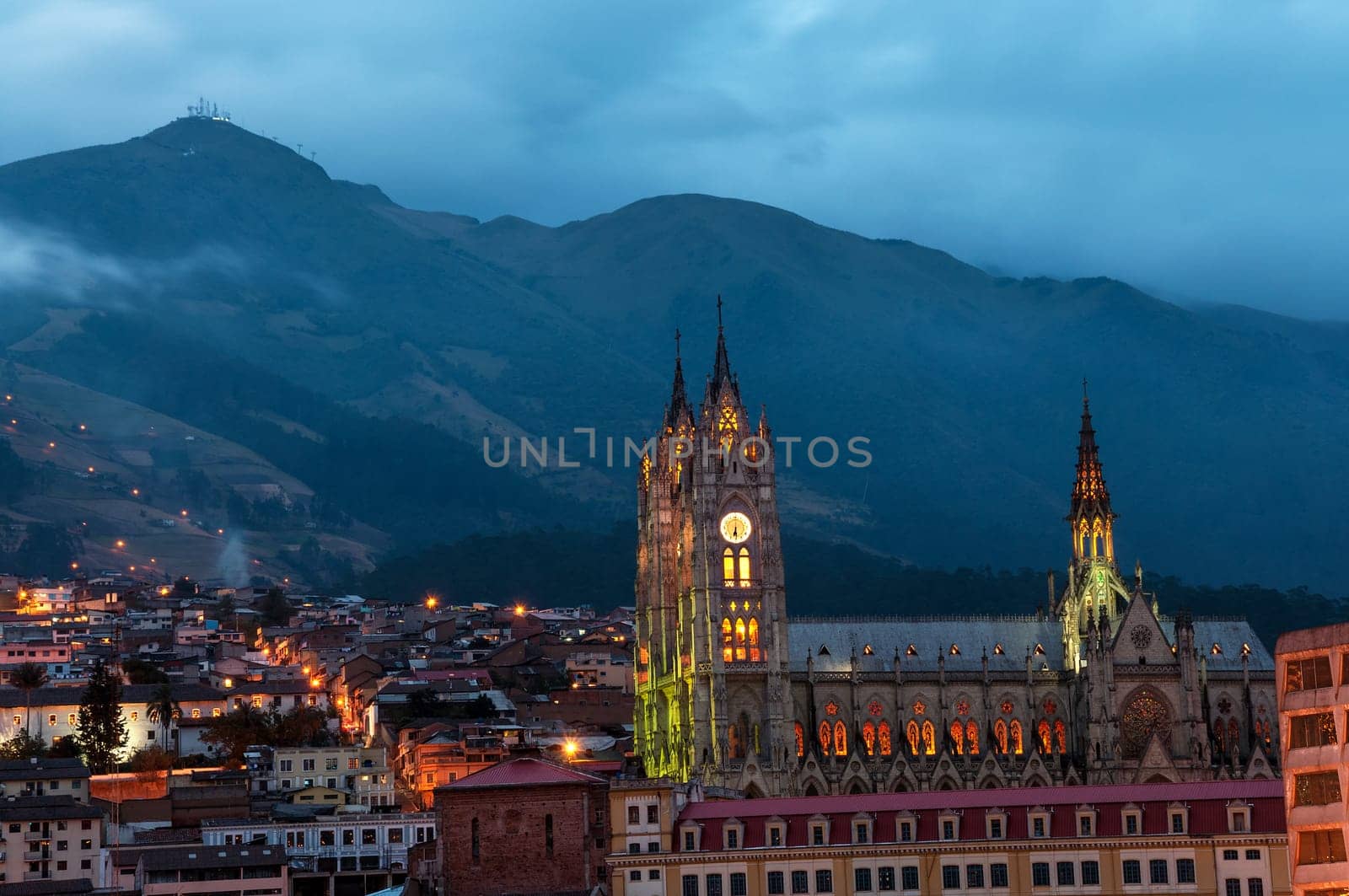 Night time view of the basilica and old town in Quito, Ecuador