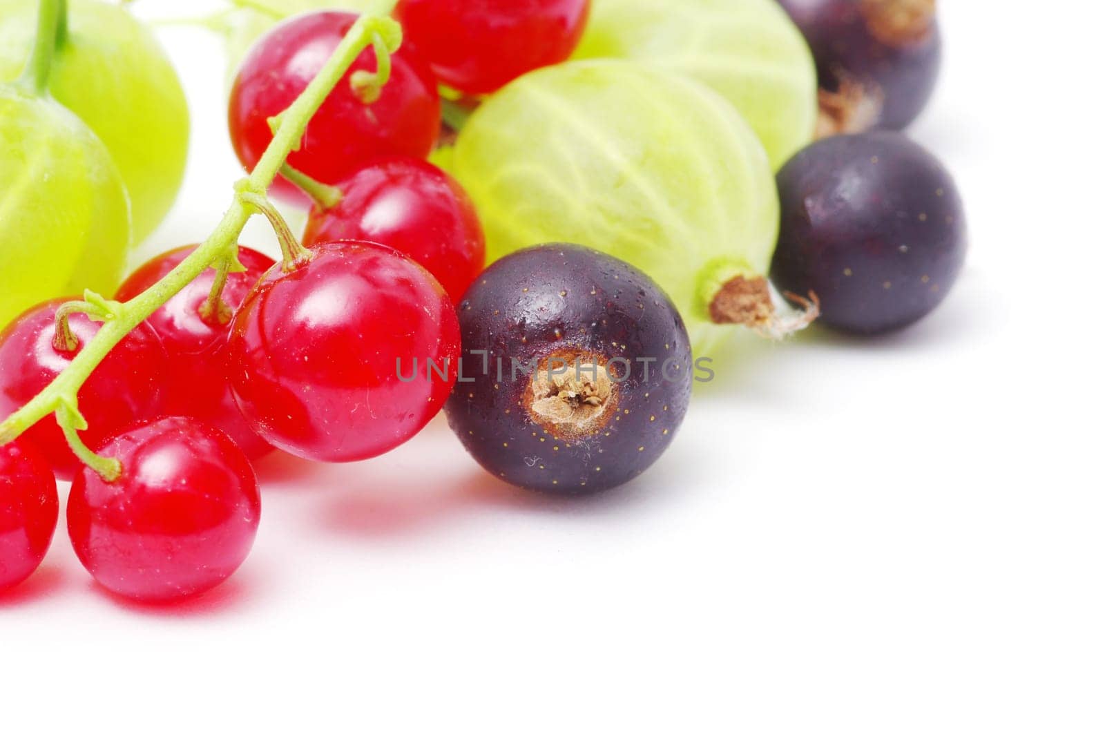 Fresh delicious summer berries isolated on white