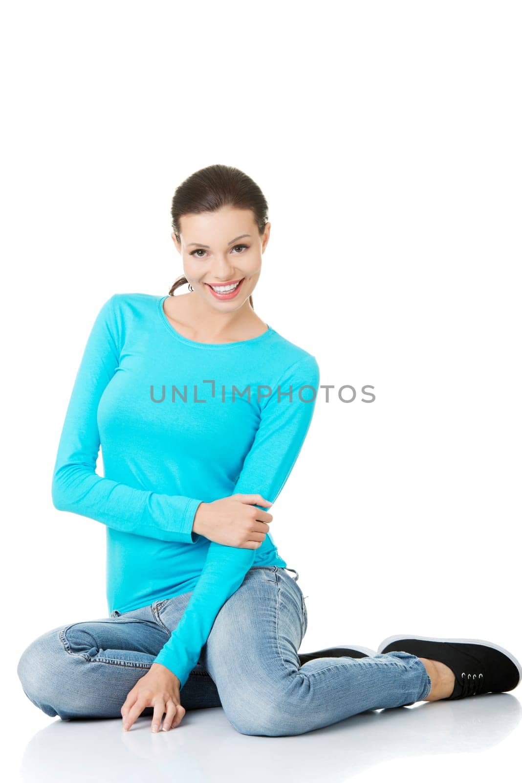Young beautiful woman in casual clothes, isolated on white