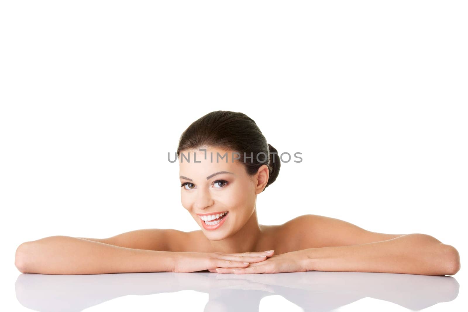 Portrait of a beautiful female model on white background