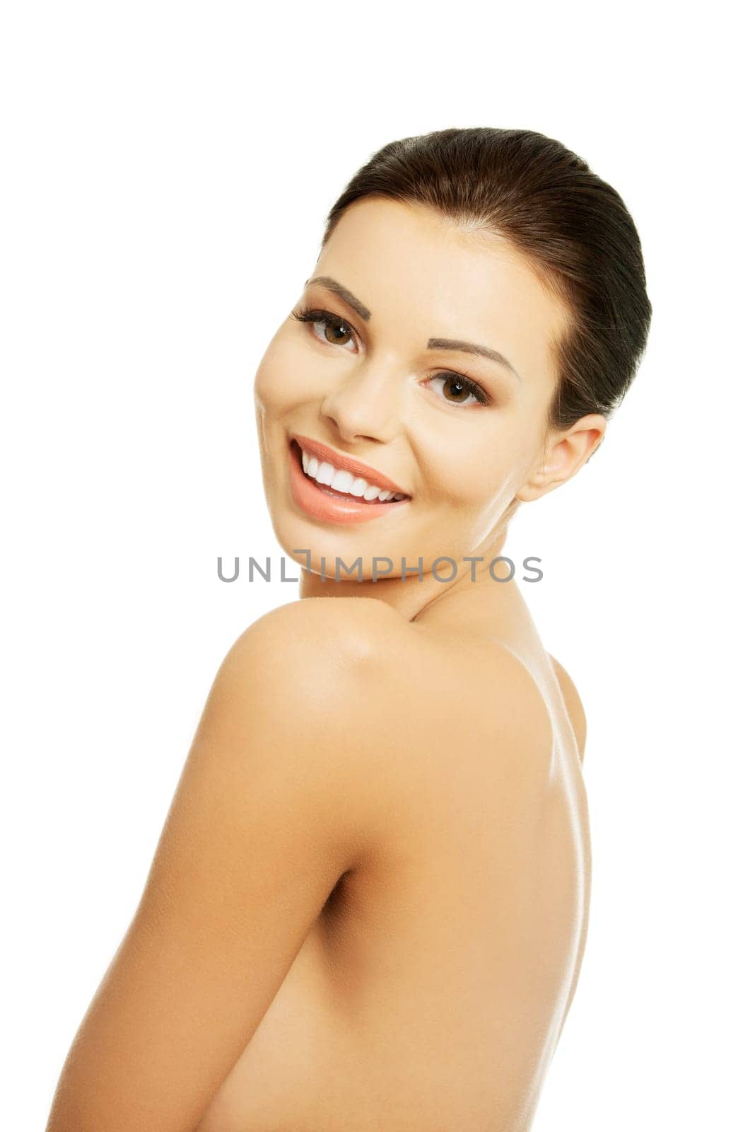 Close-up portrait of young beautiful woman face on white background
