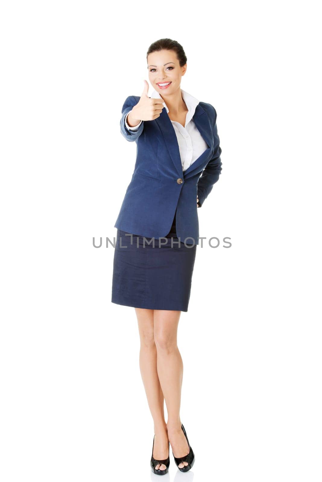 Happy smiling business woman with ok gesture