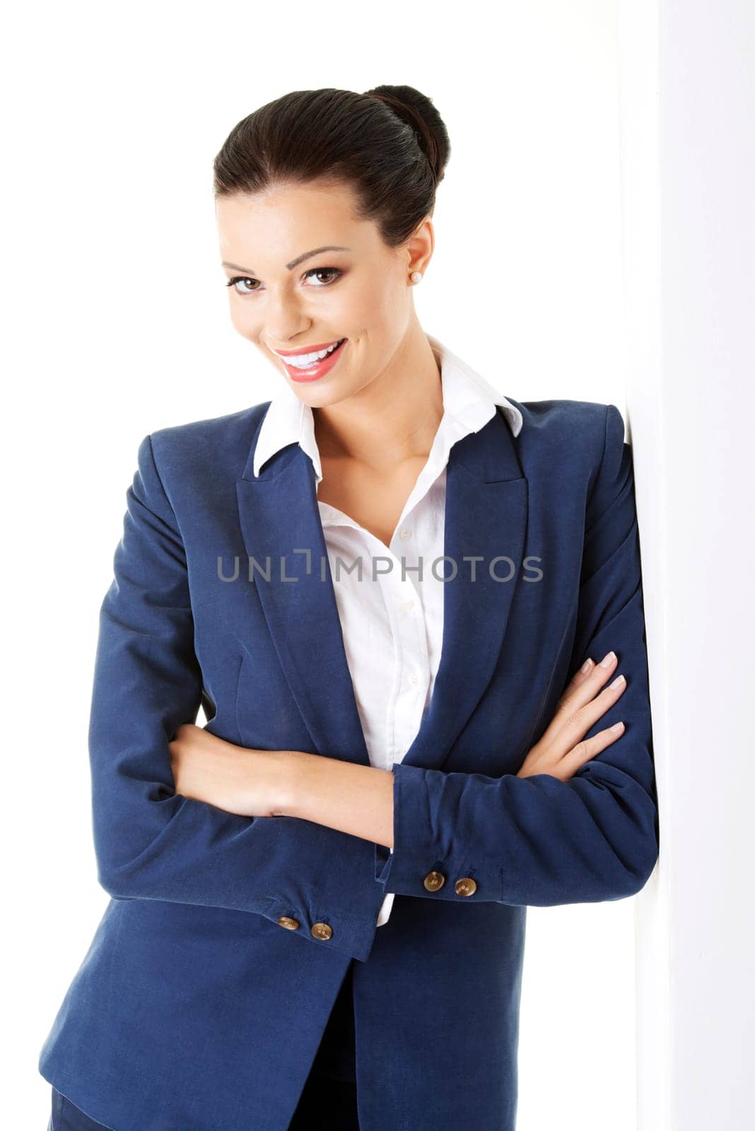 Portrait of young businesswoman or student in elegant clothes
