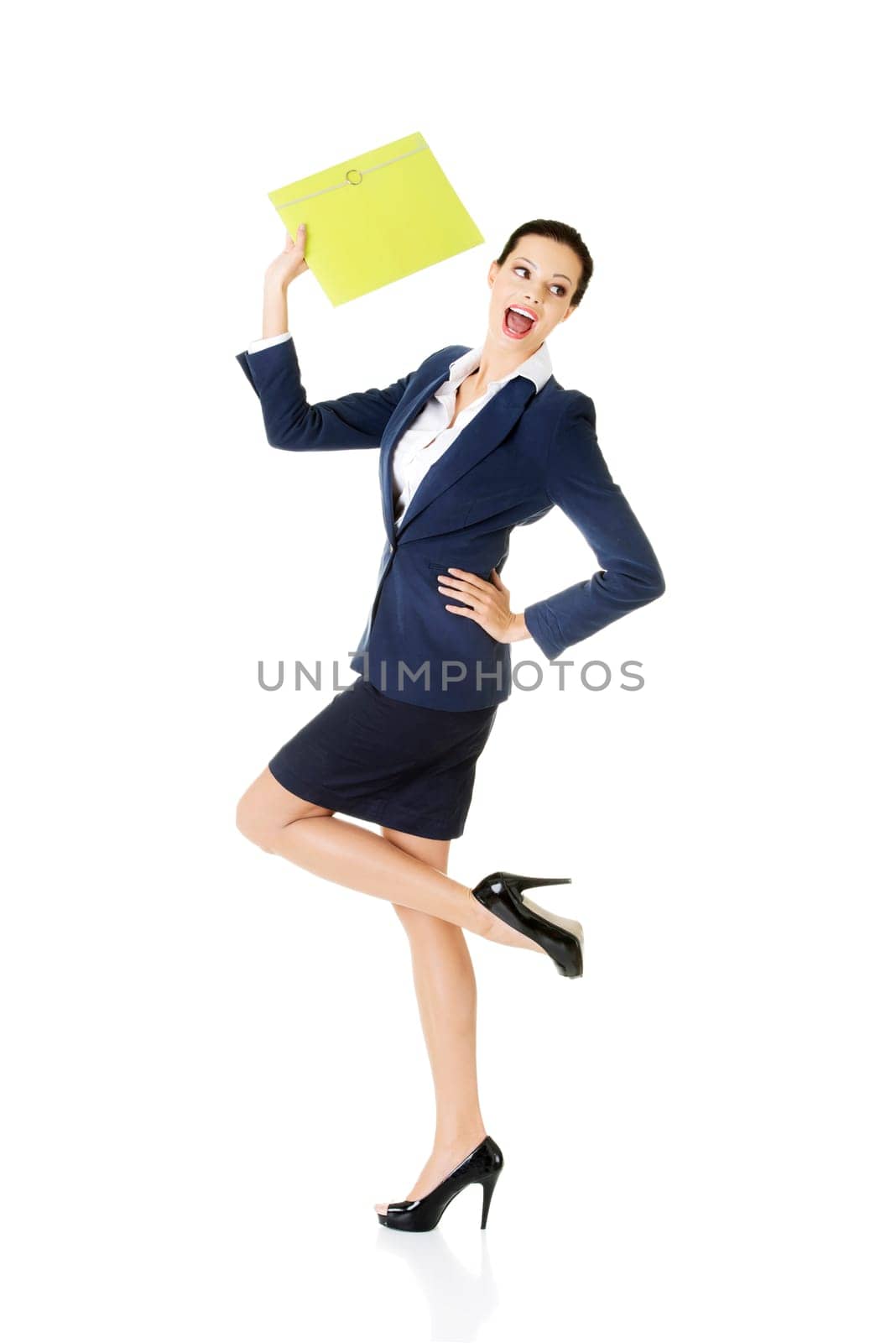Full portrait of attractive happy businesswoman holding portfolio, isolated on white
