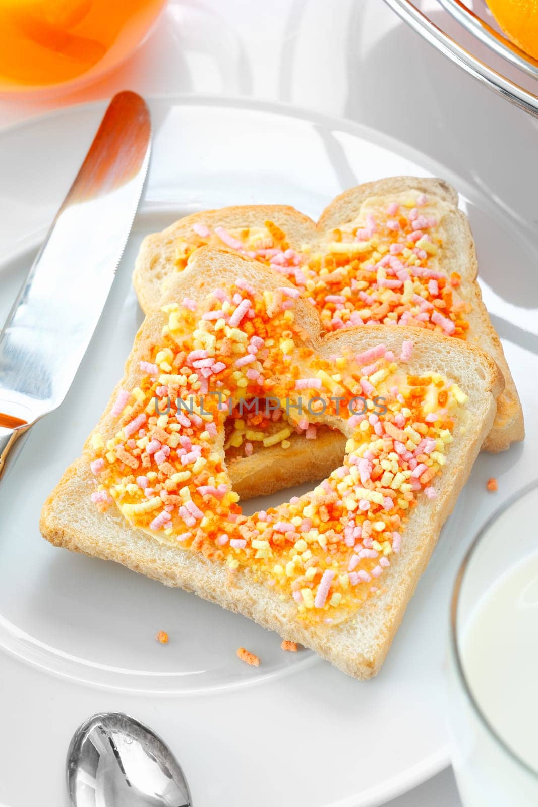 Closeup of a tasty and elegant breakfast made of bread and candies