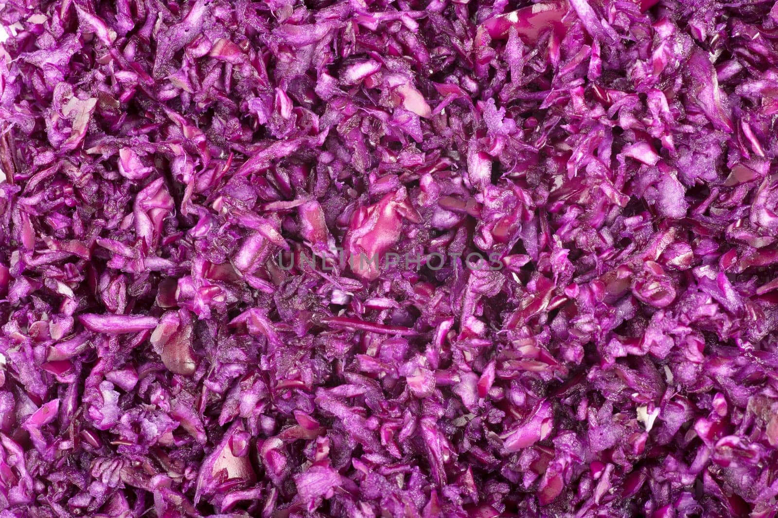Finely grated red cabbage filling frame for food background