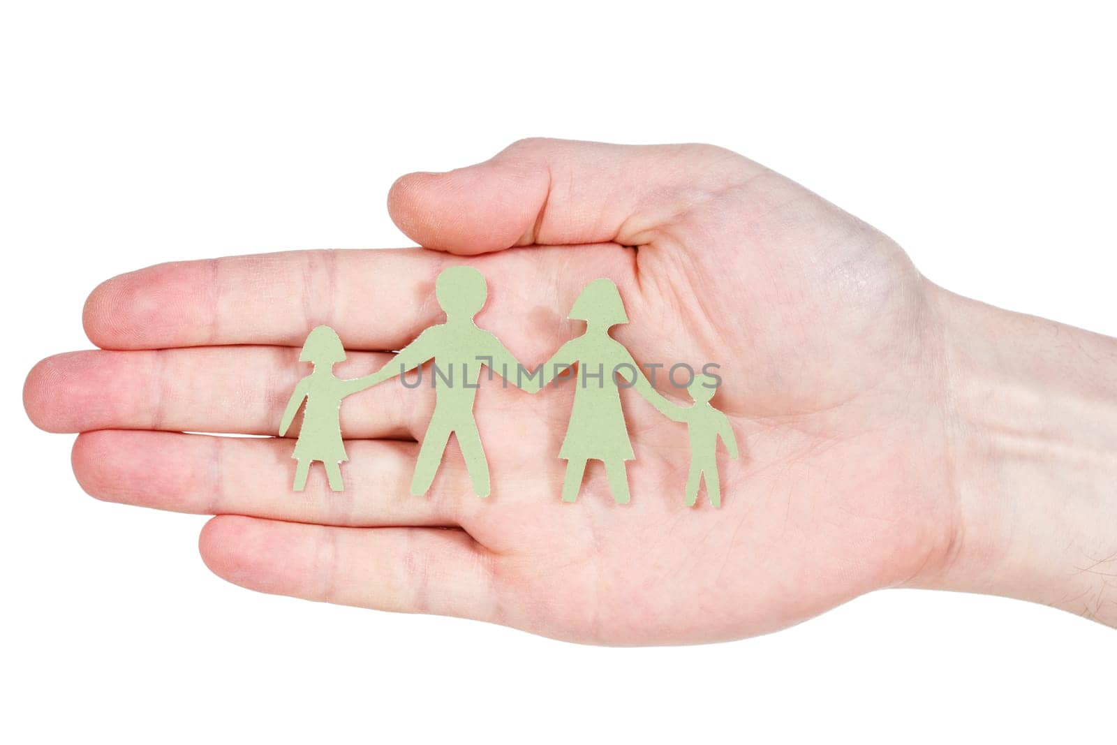 Paper family in hand isolated on white background
