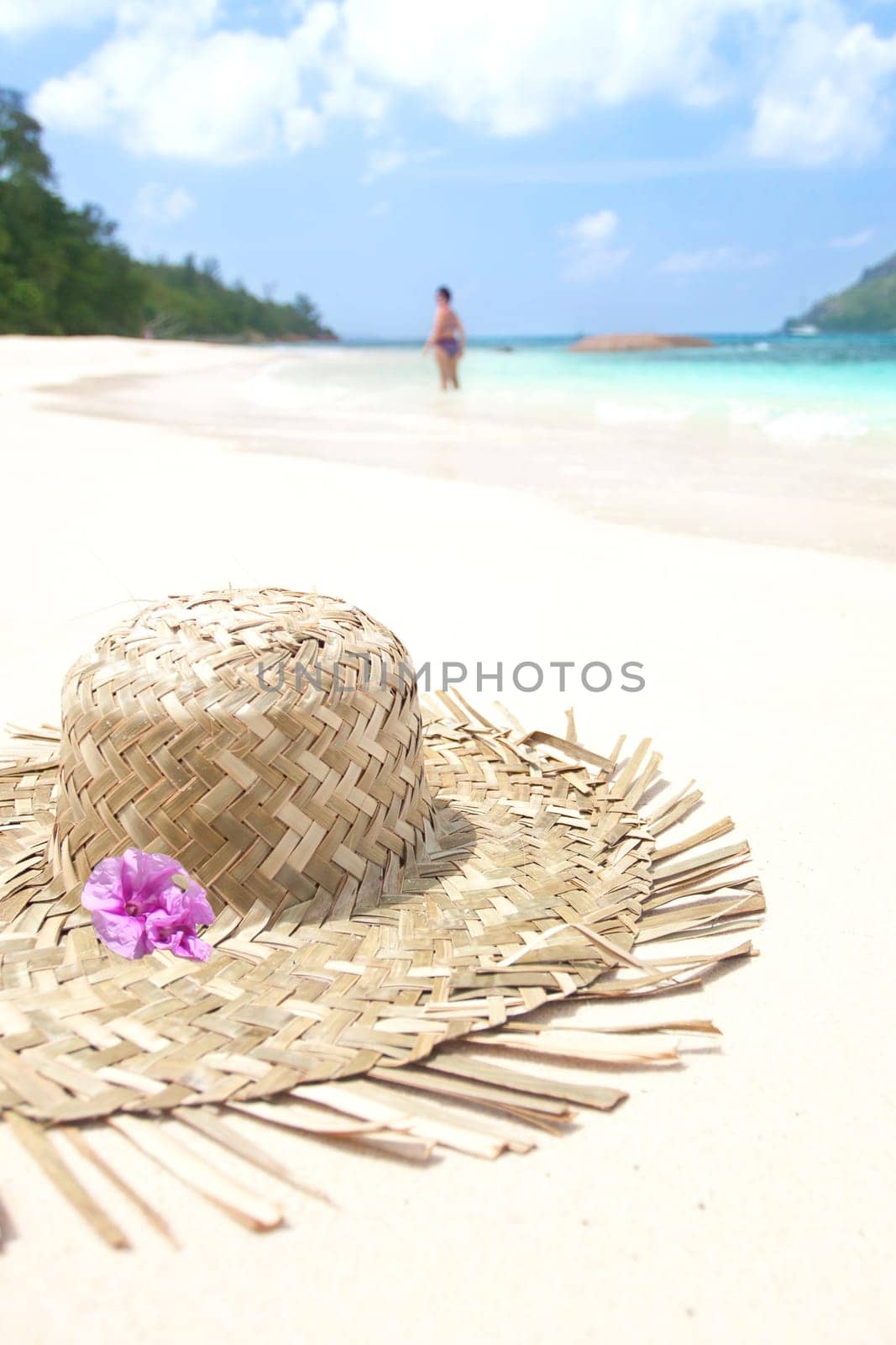 Straw hat lying on the beach