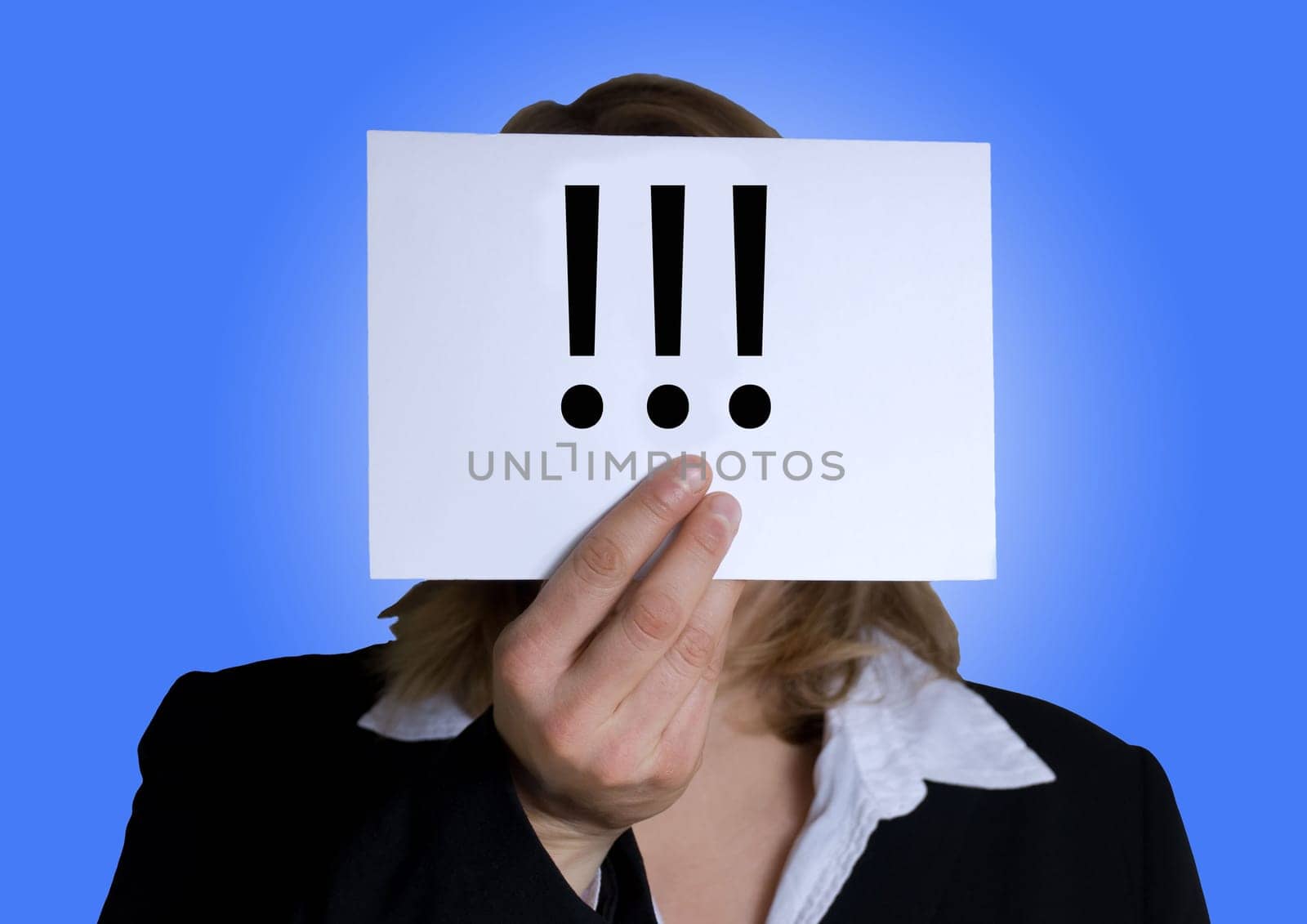 a business woman holding a banner with three exclamation marks on it, blue background