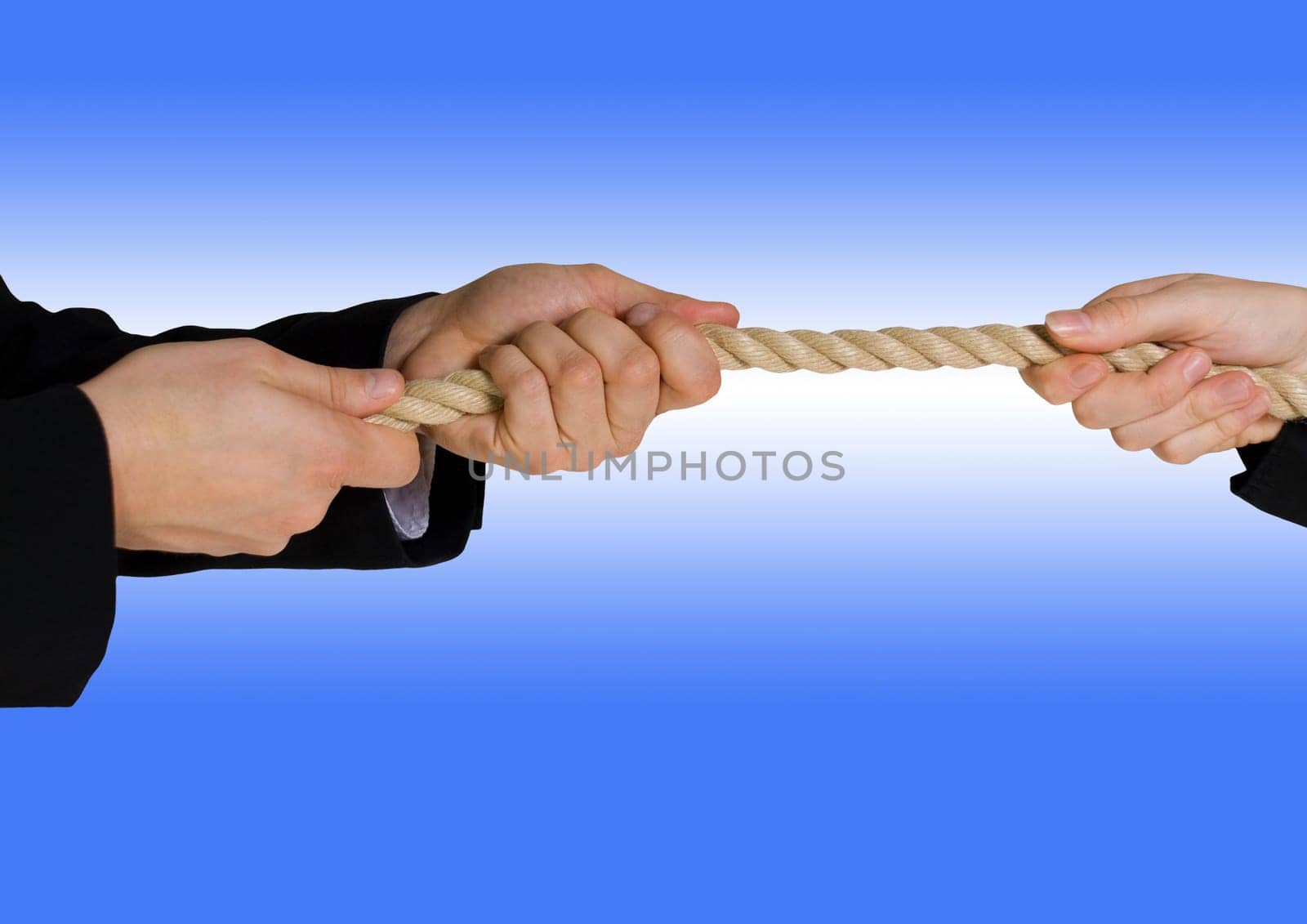tug of war between business people with blue background