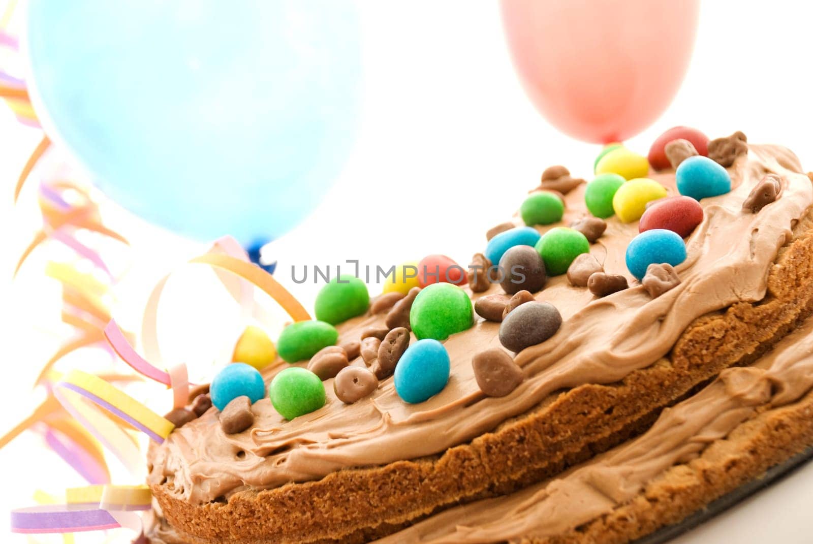 a colorful birthday chocolate cake