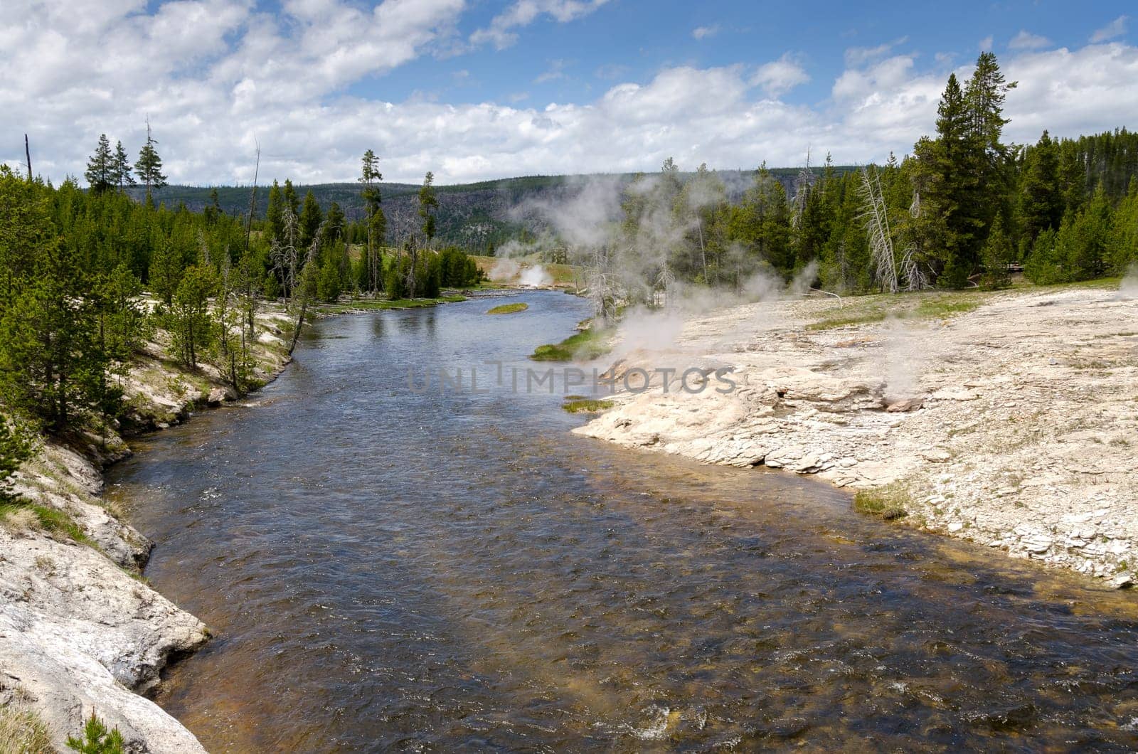 River and geyser in Yellowstone National Park in Wyoming in the United States of America