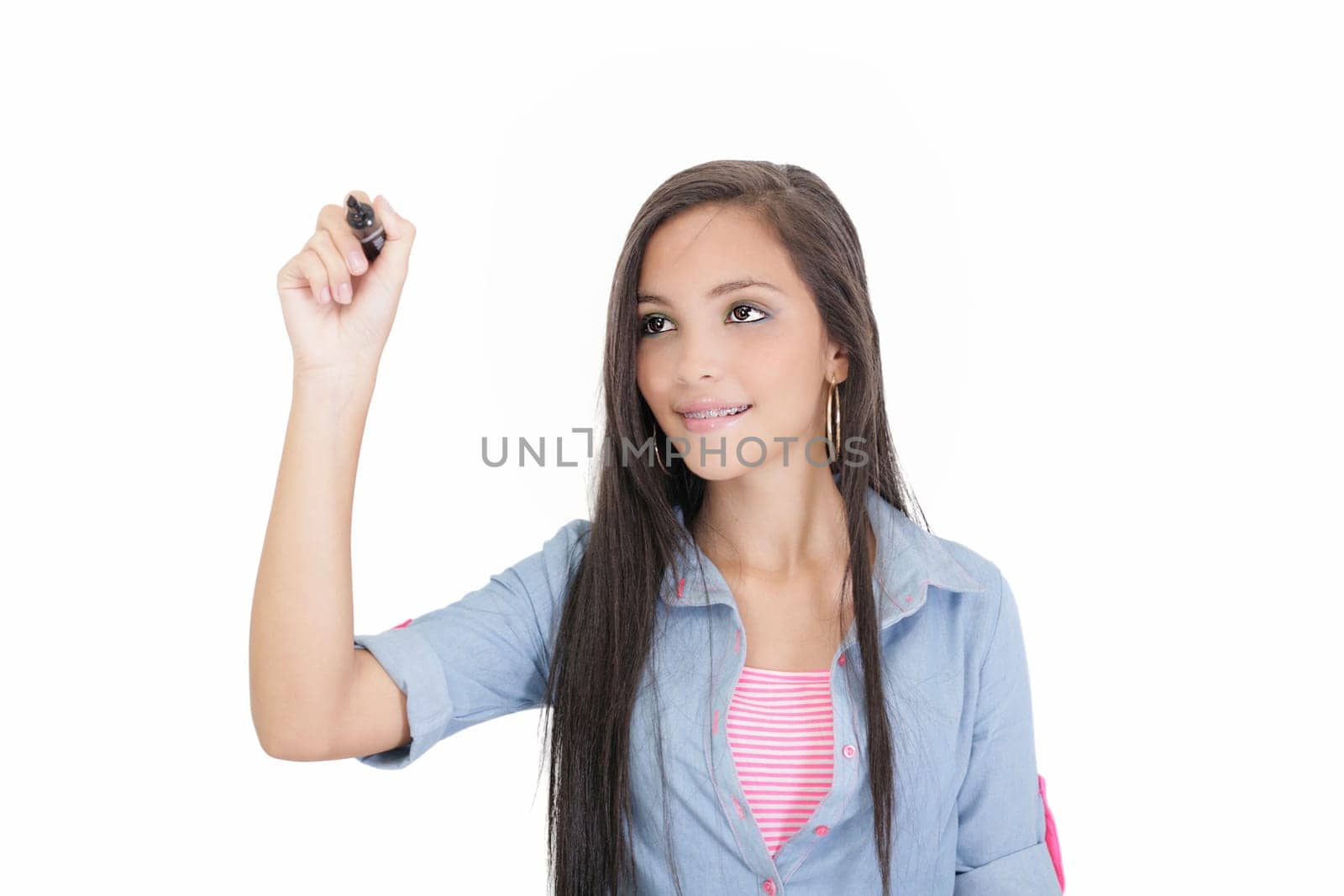 woman writing or drawing something on screen or transparent glass, by black marker, isolated over white background