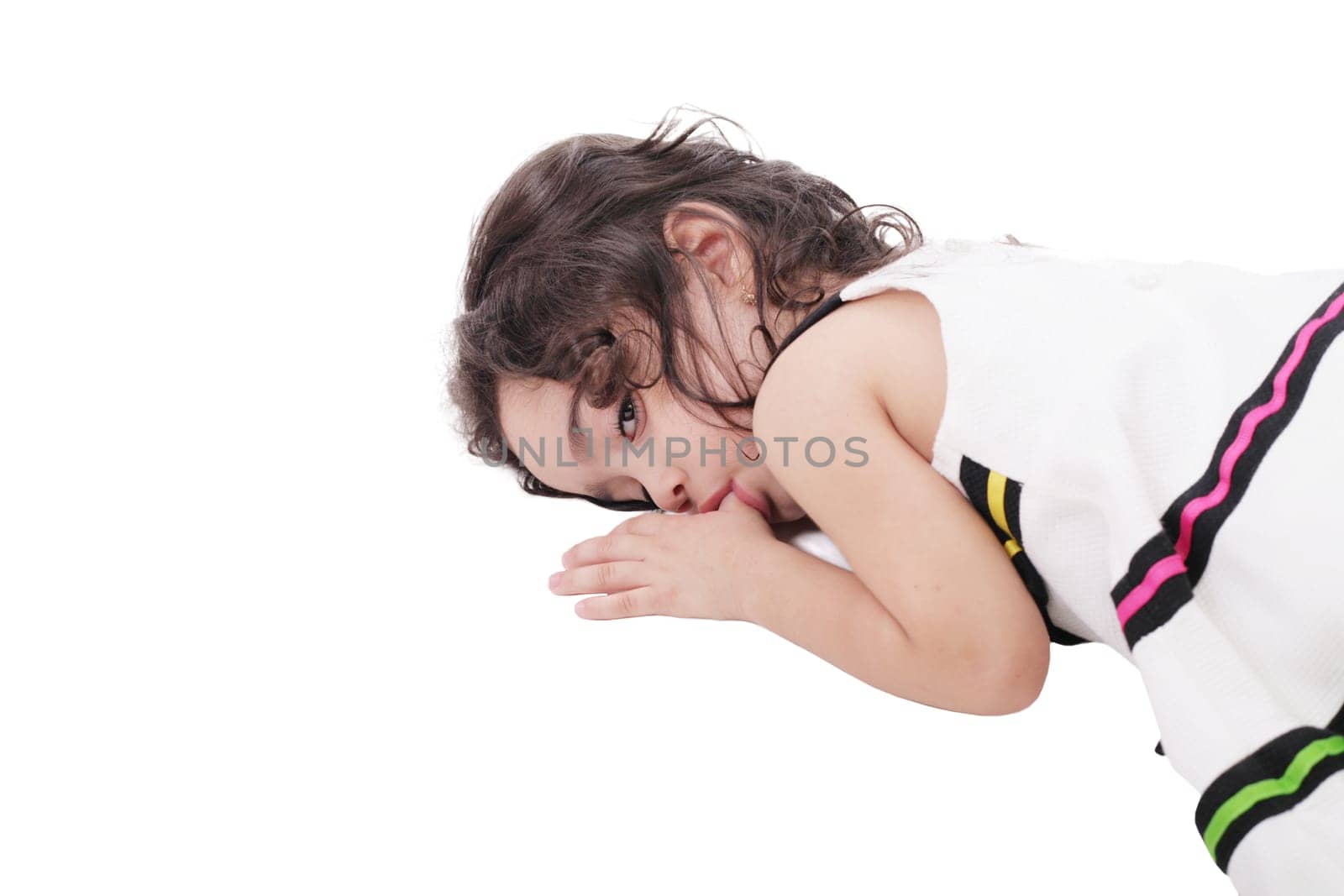 small child holding a finger in his mouth. studio photos. Close-up portrait. isolated on white